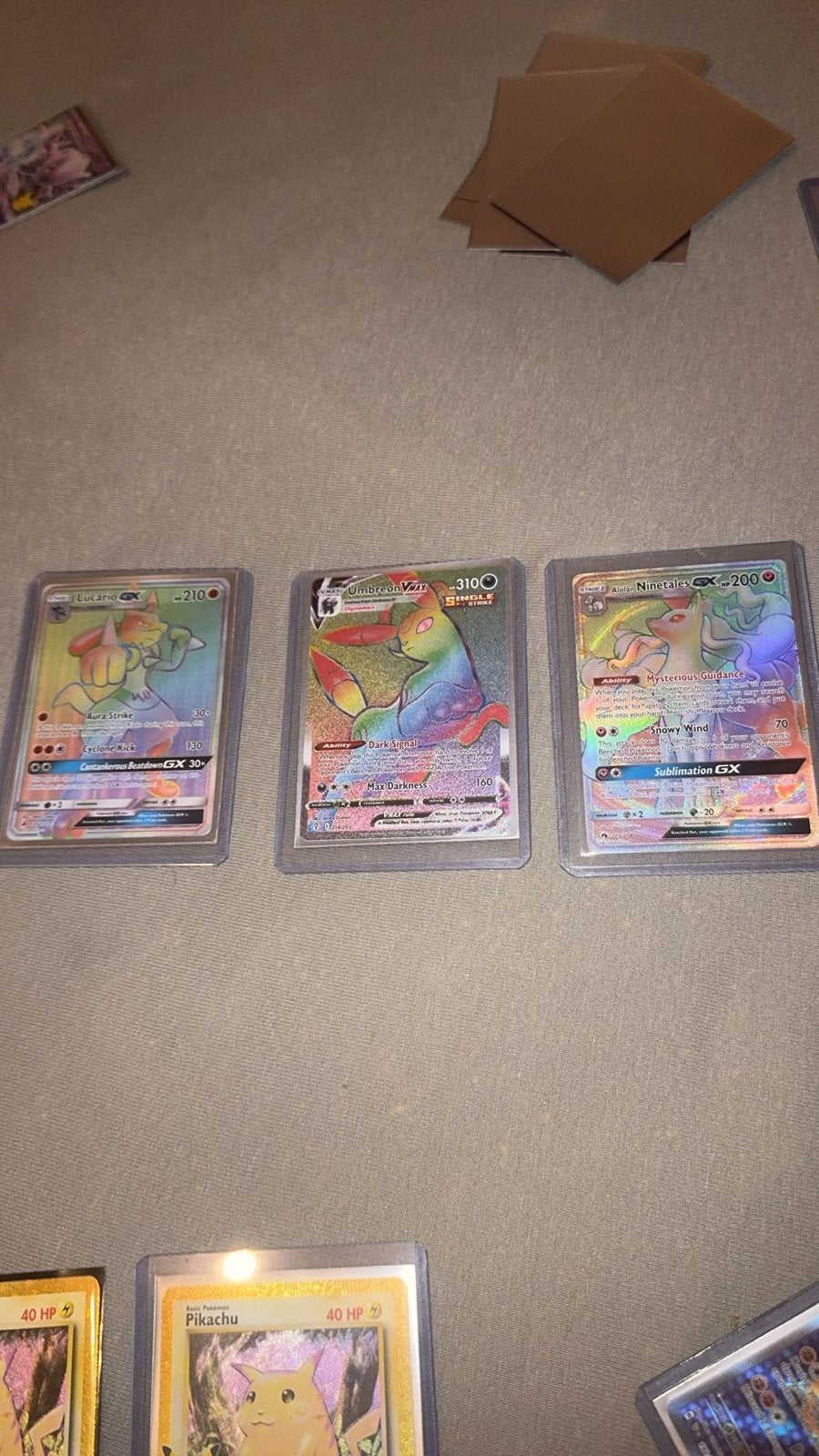 Pokémon Kaarten: Lucario GX, Umbreon VMAX, Alolan Ninetales, Ophalen of Verzenden, Zo goed als nieuw, Meerdere kaarten, Foil