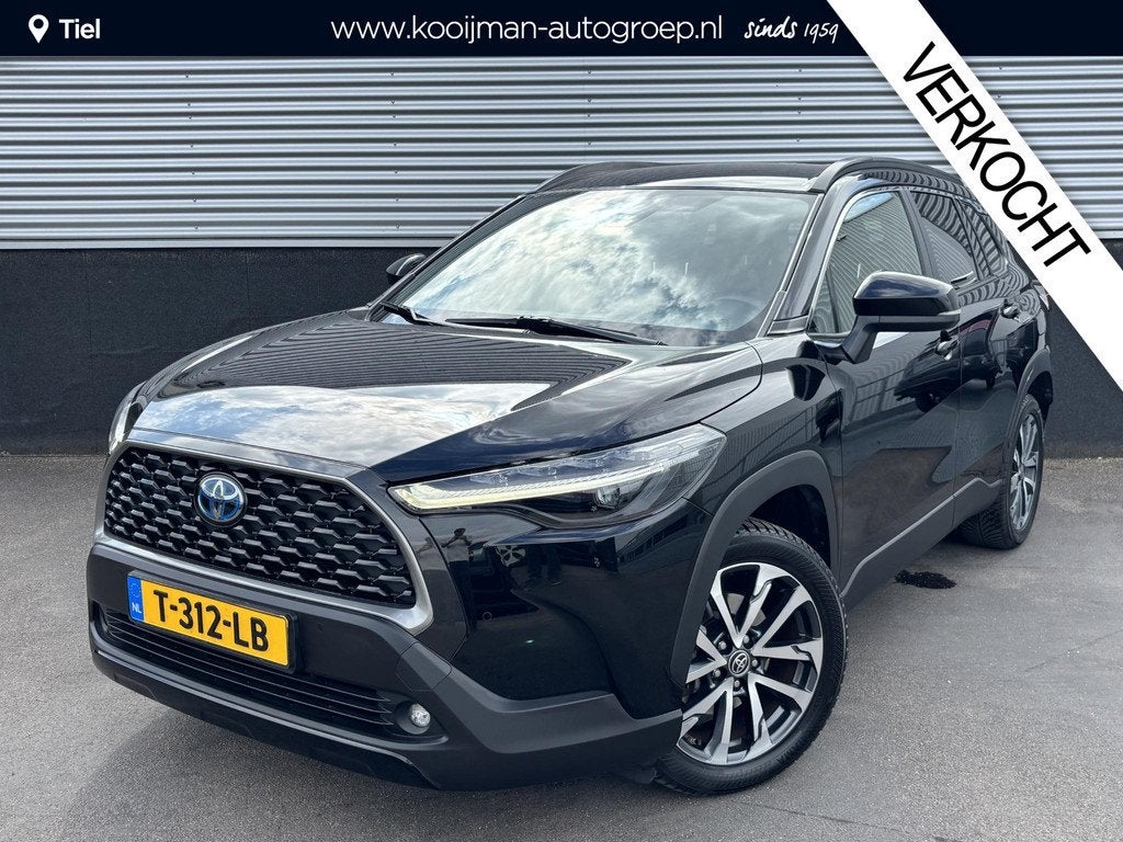 Toyota Corolla Cross 2.0 High Power Hybrid First Edition Nie, Auto's, Toyota, Gebruikt, 4 cilinders, Leder en Stof, Zwart
