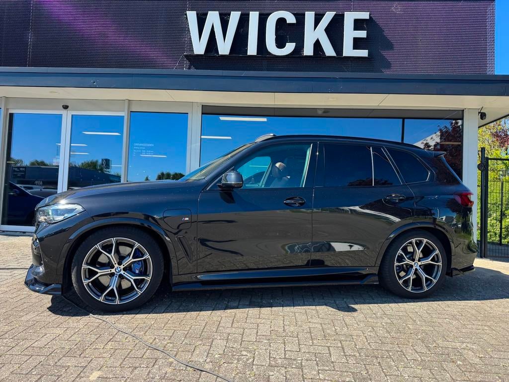 BMW X5 XDrive45e High Executive HUD Pano 360 Trekhaak MAXTON, Auto's, 394 pk, Zwart, Vierwielaandrijving, Hybride Elektrisch/Benzine