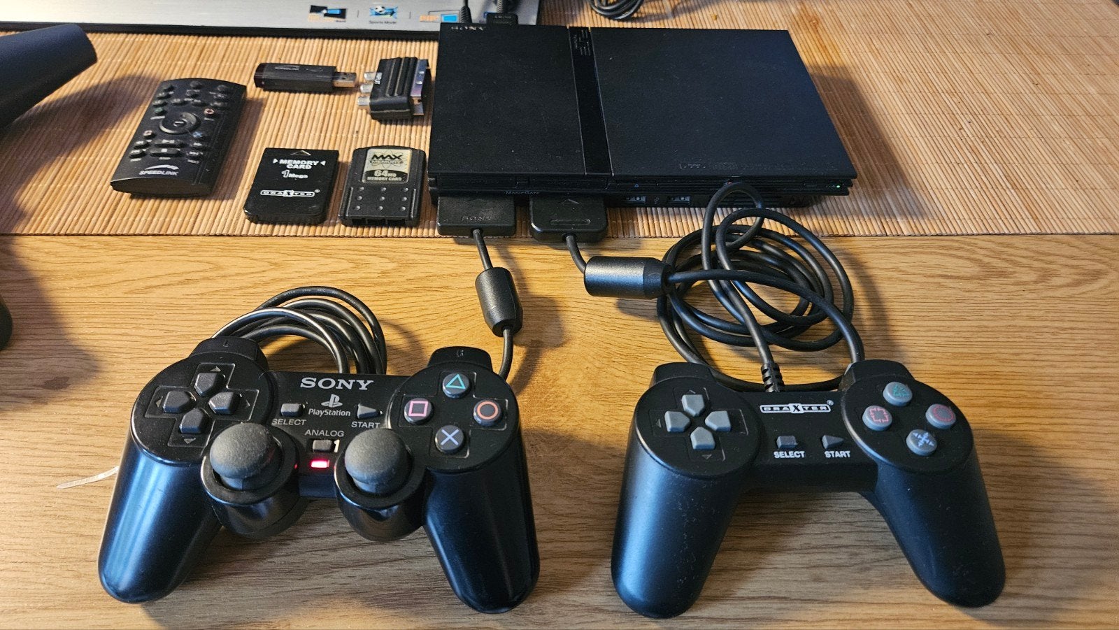 Sony PlayStation 2 Slim met 2 controllers en 11 games, Gebruikt, Zwart, Met games, Met 2 controllers