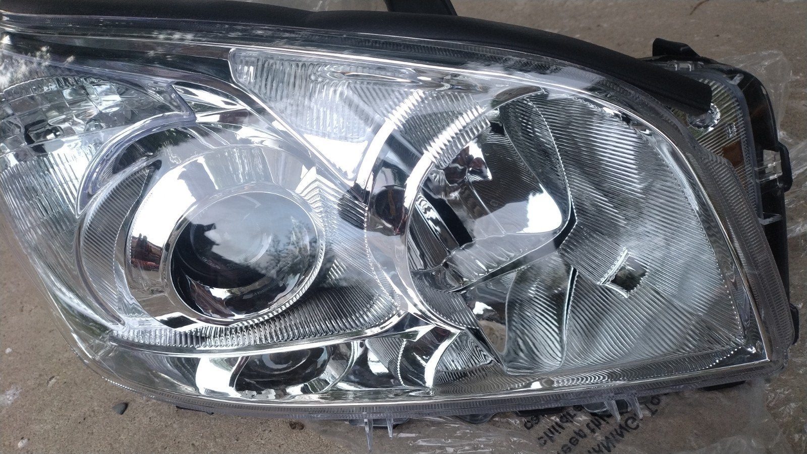 Toyota rav 4 koplamp met projector bouwjaar 2006tmt 2009 lv, Ophalen of Verzenden, Nieuw, Toyota