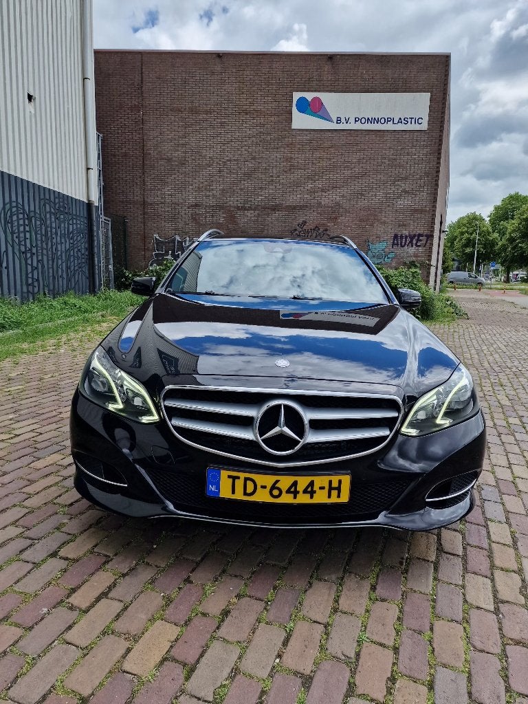 Mercedes-Benz E-Klasse E200 135KW Estate Aut7 2013 Zwart, Achterwielaandrijving, Zwart, 4 cilinders, Leder en Stof