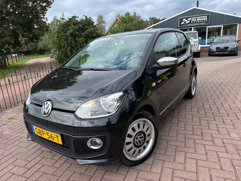 Volkswagen UP *Black UP! *Cruise*Airco*PDC, Auto's, Euro 5, Gebruikt, Met garantie (alle), 4 stoelen