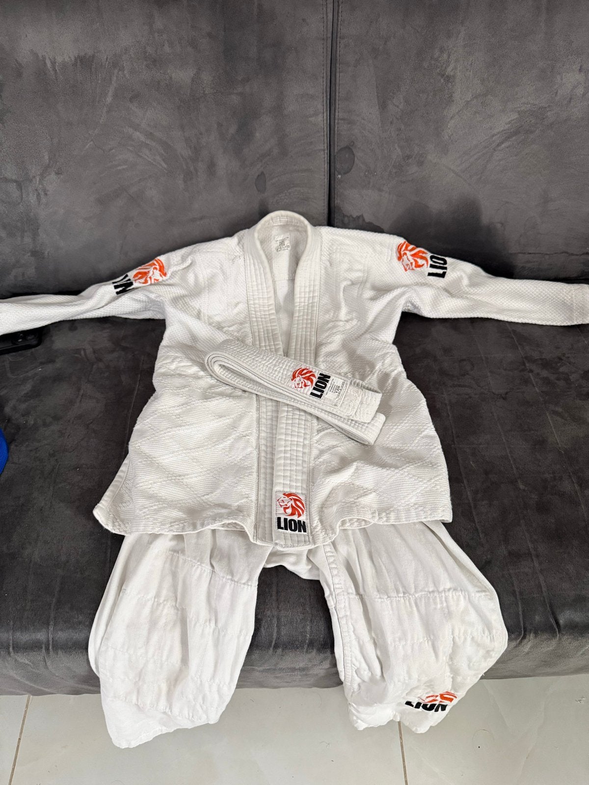 Wit vechtsportpak - Lion (maat 120 kind), Gebruikt, Maat XS of kleiner, Judo, Vechtsportpak