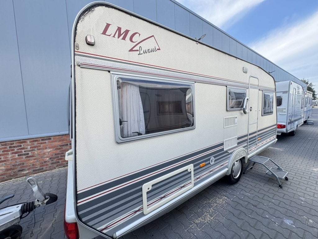 LMC De Luxus 495 E / aparte bedden / voortent, Caravans en Kamperen, Rondzit, Bedrijf, Luifel, 4 tot 5 meter