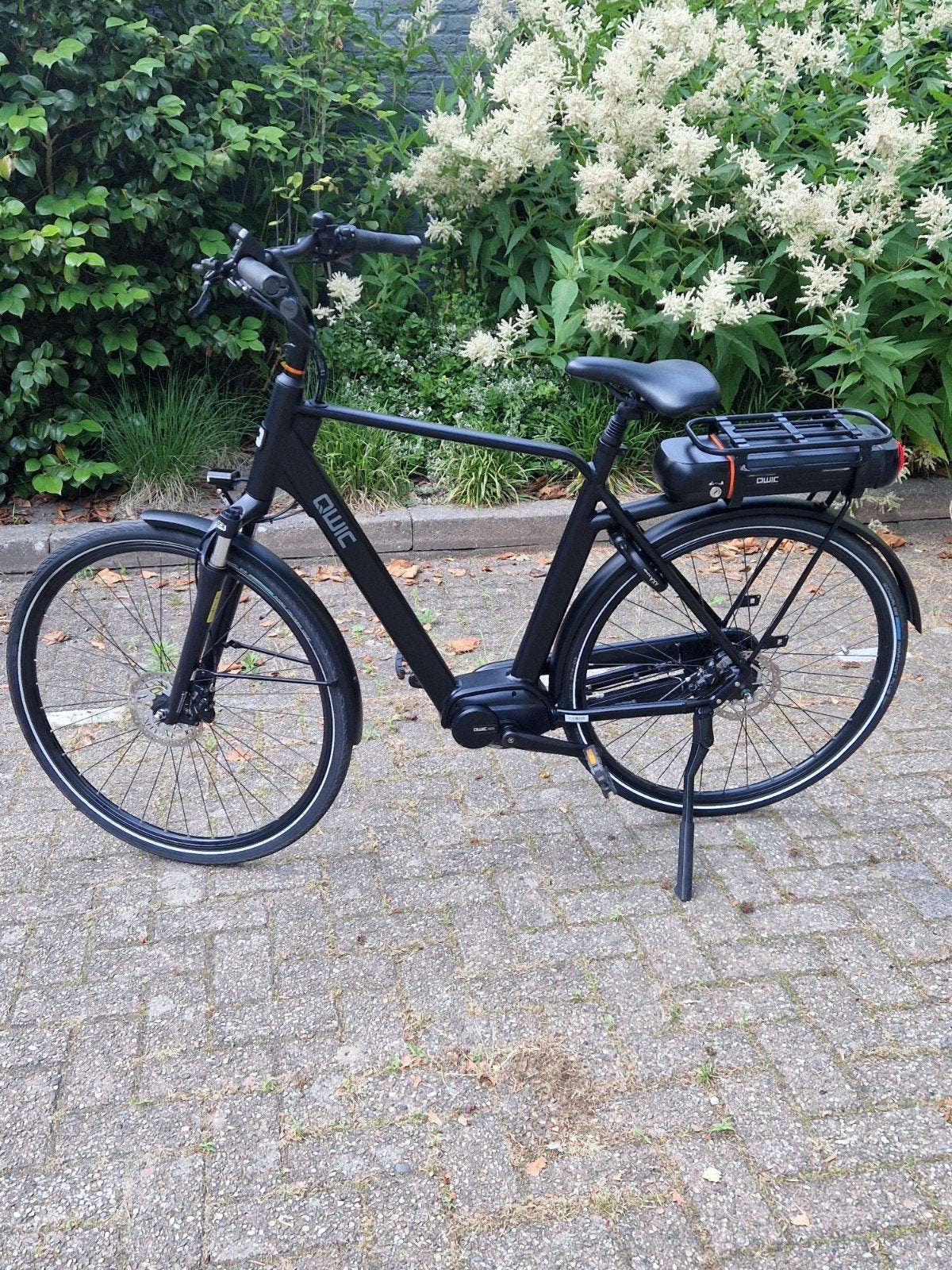 Qwic premium MN7D middenmotor Bafang, Fietsen en Brommers, Elektrische fietsen, Ophalen, Qwic, Zo goed als nieuw, 50 km per accu of meer