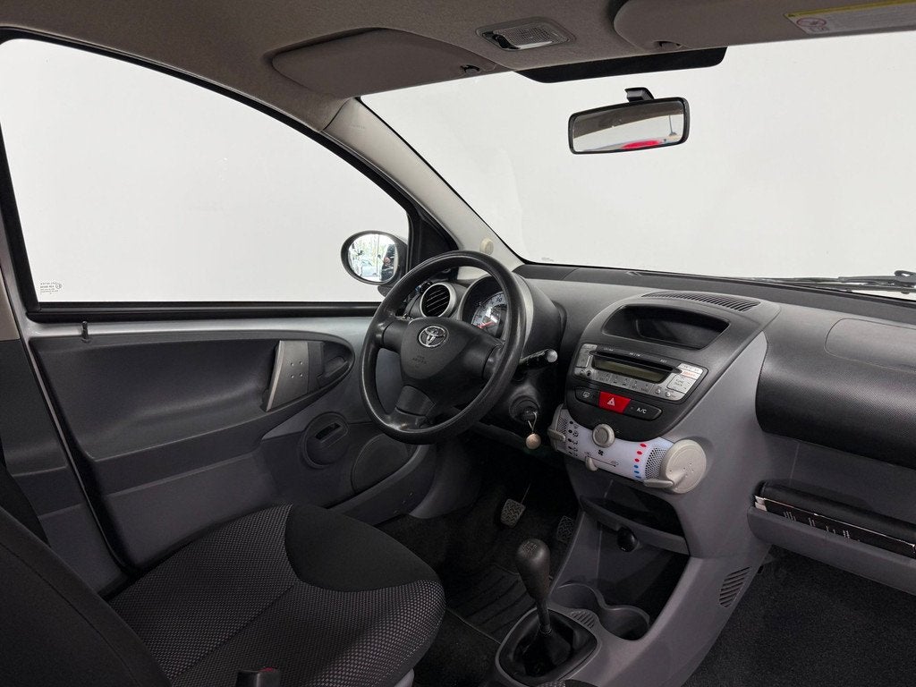 Toyota Aygo 1.0-12V Now Airco/Elektrische ramen, Auto's, Voorwielaandrijving, Stof, Gebruikt, Huisgarantie