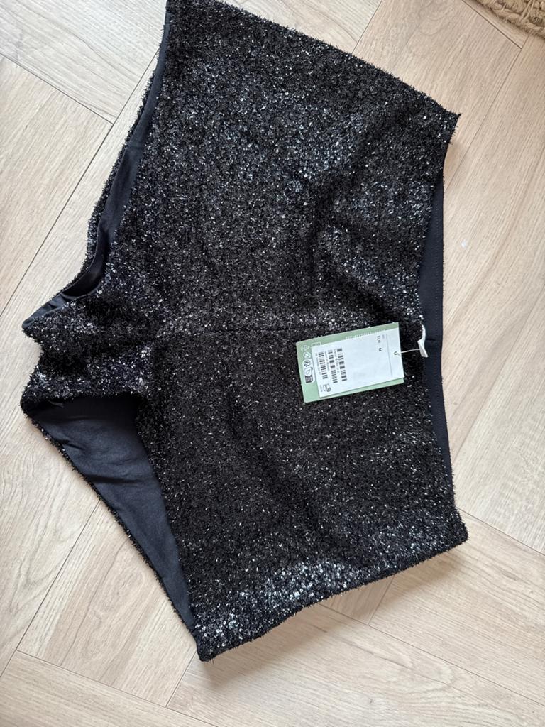 Zwarte glitter shorts H&M - Maat M, Ophalen of Verzenden, Zwart