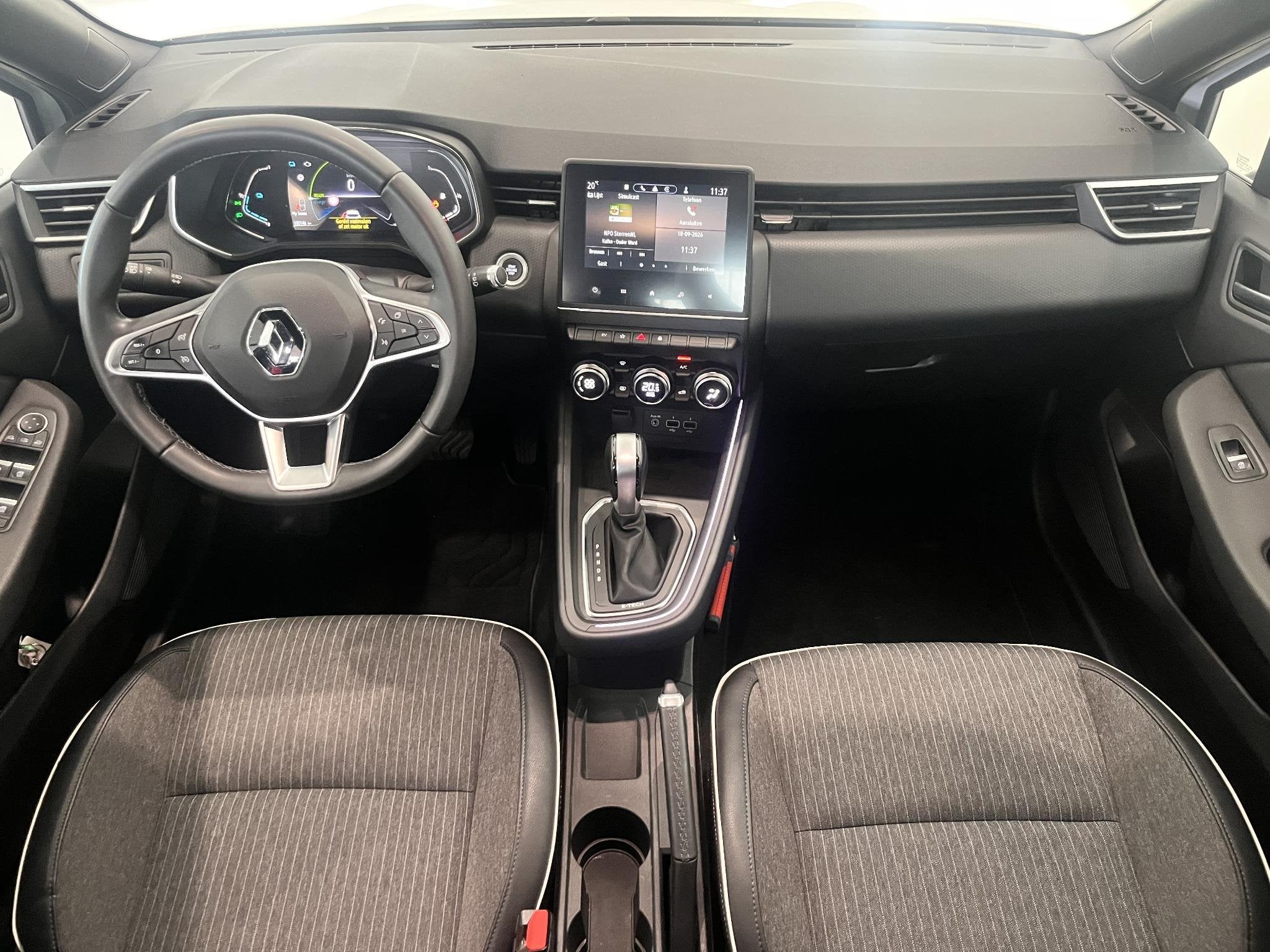 Renault Clio 1.6 E-Tech Hybrid 140 Intens | Climate Control, Auto's, Gebruikt, 4 cilinders, Met garantie (alle), Wit