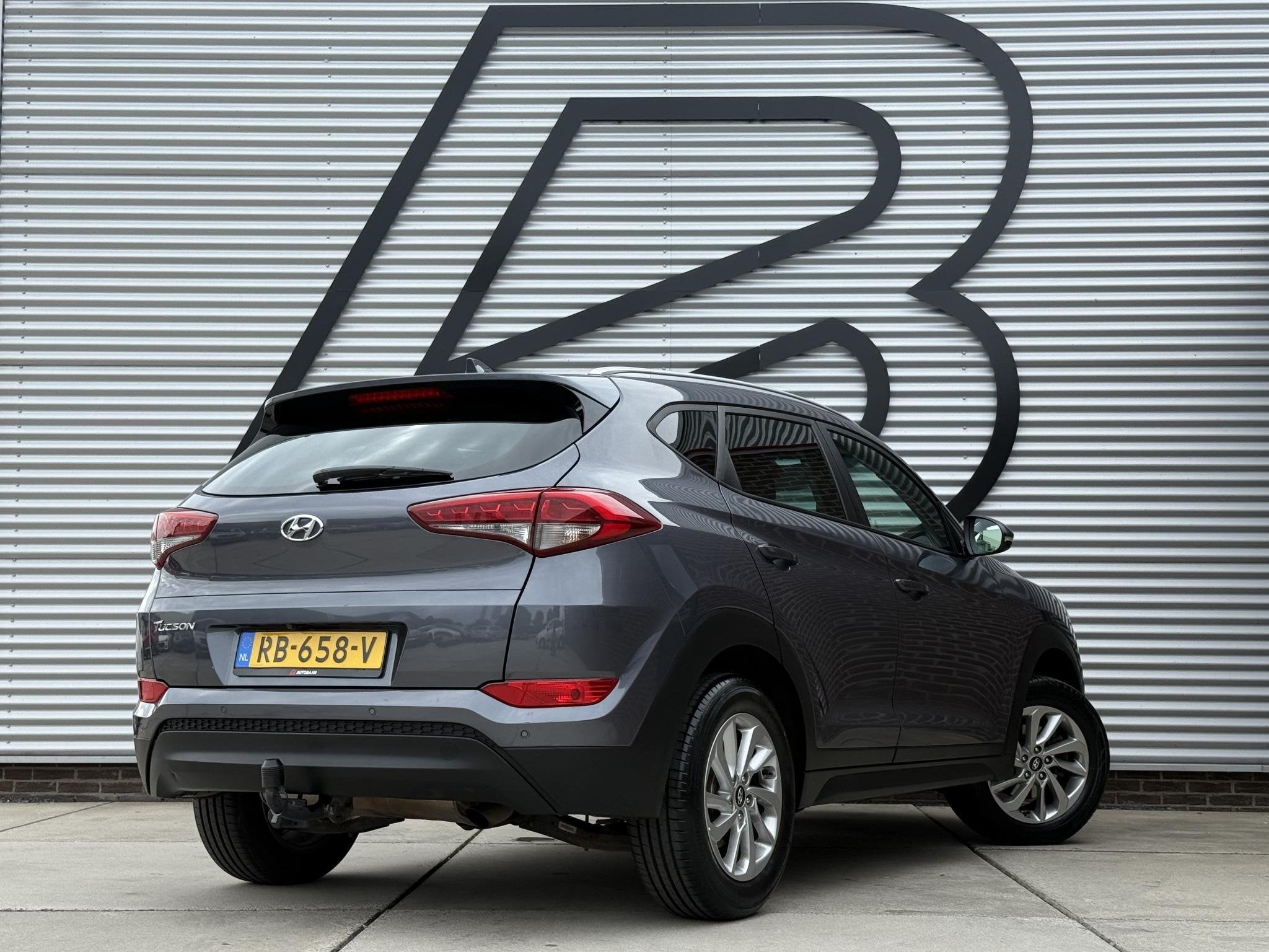 Hyundai Tucson 1.6 GDi Comfort 1e Eigenaar|Navi|Camera|Clima, Auto's, Voorwielaandrijving, Gebruikt, 4 cilinders, 132 pk