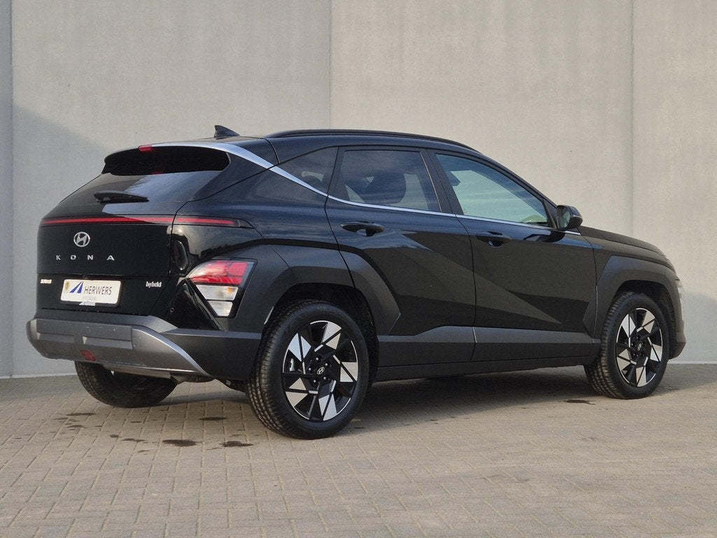 Hyundai Kona 1.6 GDI HEV Comfort Smart / Fabrieksgarantie to, Auto's, Hyundai, Stof, Gebruikt, Euro 6, Zwart