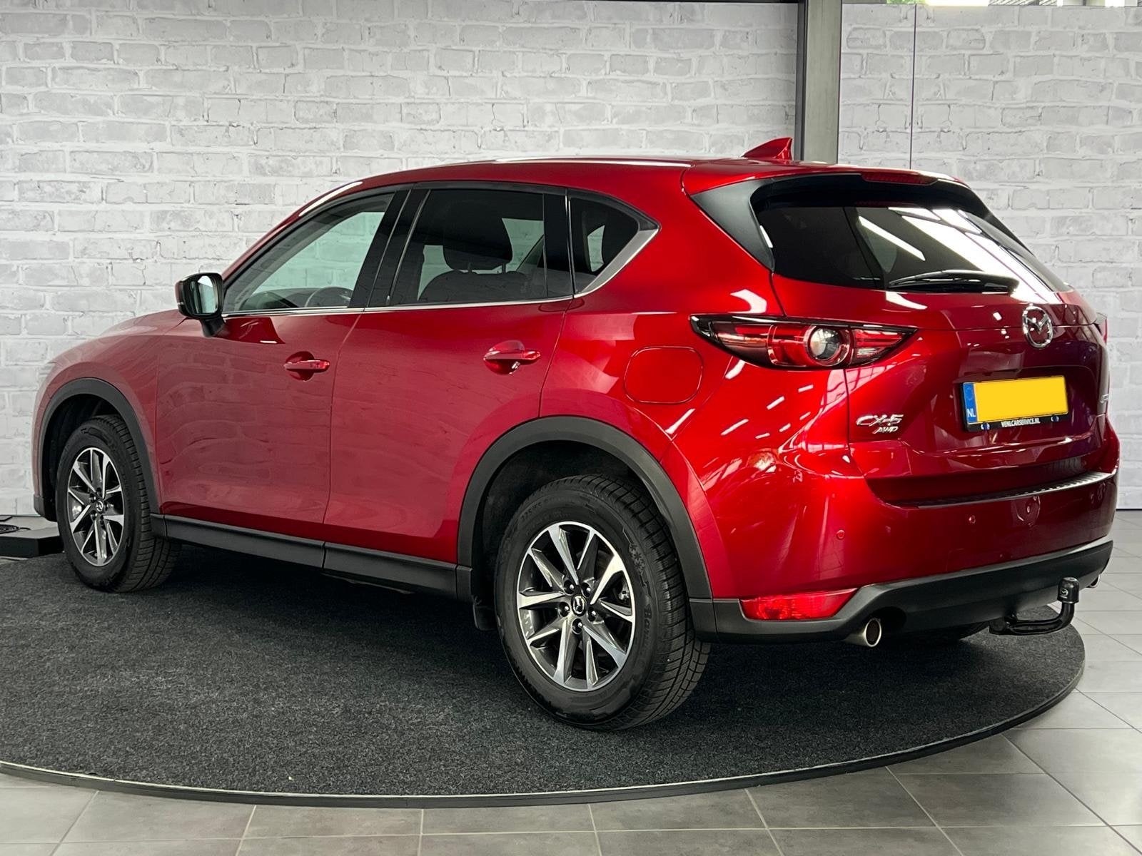 Mazda CX-5 2.5 4WD SkyActiv-G 194 Luxury Pano HUD Trekhaak B, Auto's, Gebruikt, 4 cilinders, 2000 kg, Automatische klimaatregeling