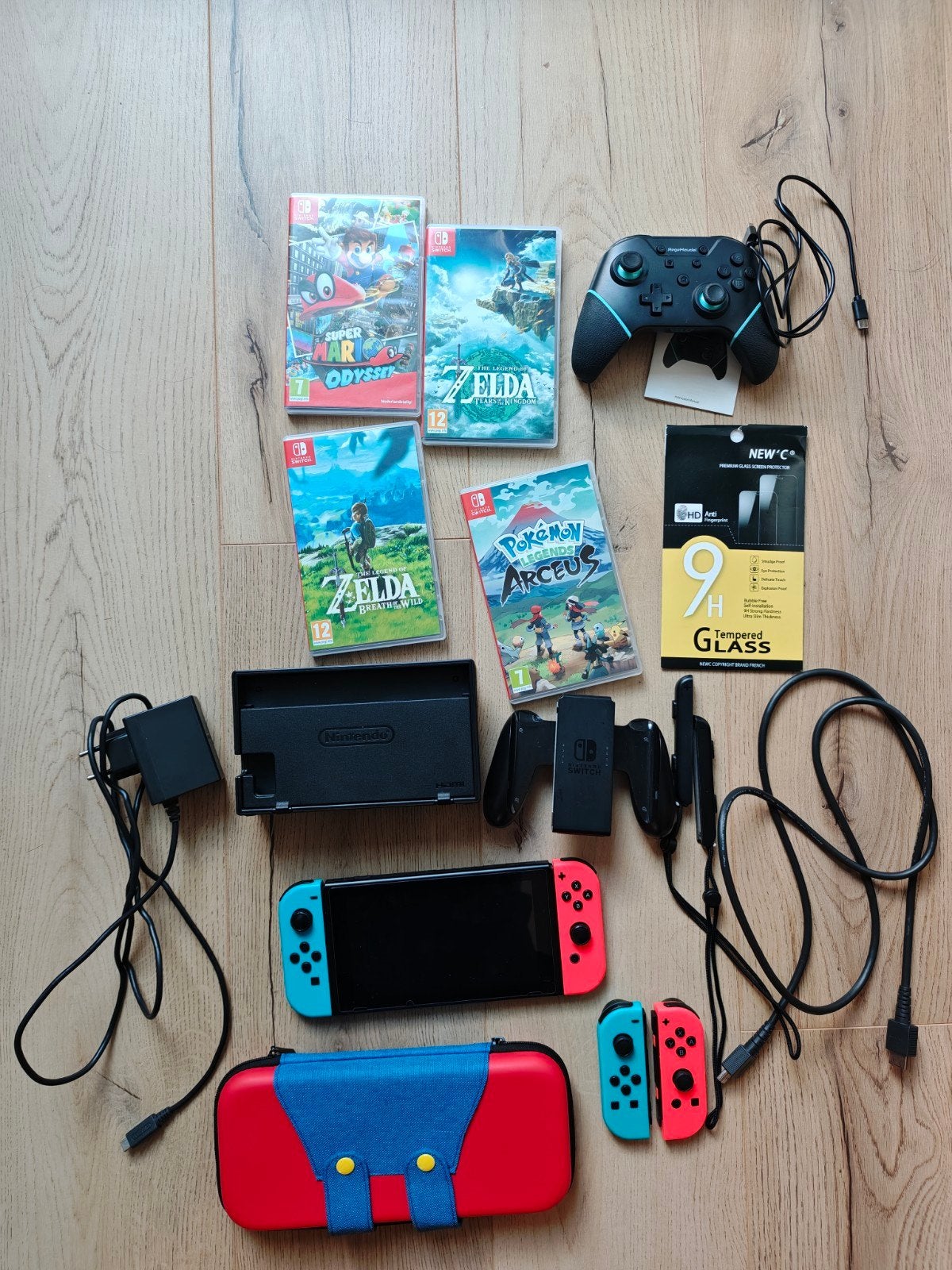 Nintendo Switch complete set + 4 games + extra Joy-Cons
