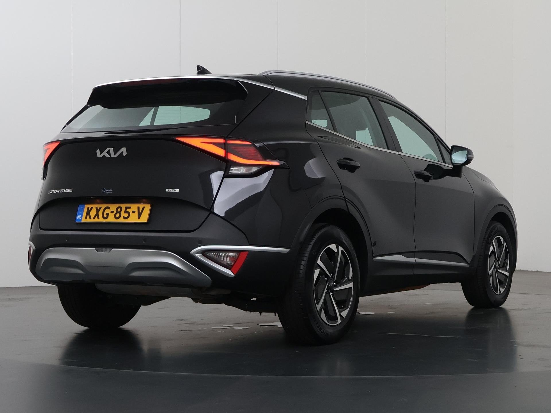 Kia Sportage 1.6 T-GDi Hybrid DynamicLine | Adaptieve Cruise, Auto's, Stof, Gebruikt, 4 cilinders, 1360 kg