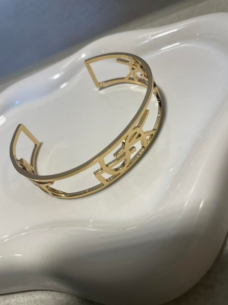 Ysl armband, Sieraden, Tassen en Uiterlijk, Armbanden, Ophalen of Verzenden, Zo goed als nieuw, Zwart, Goud