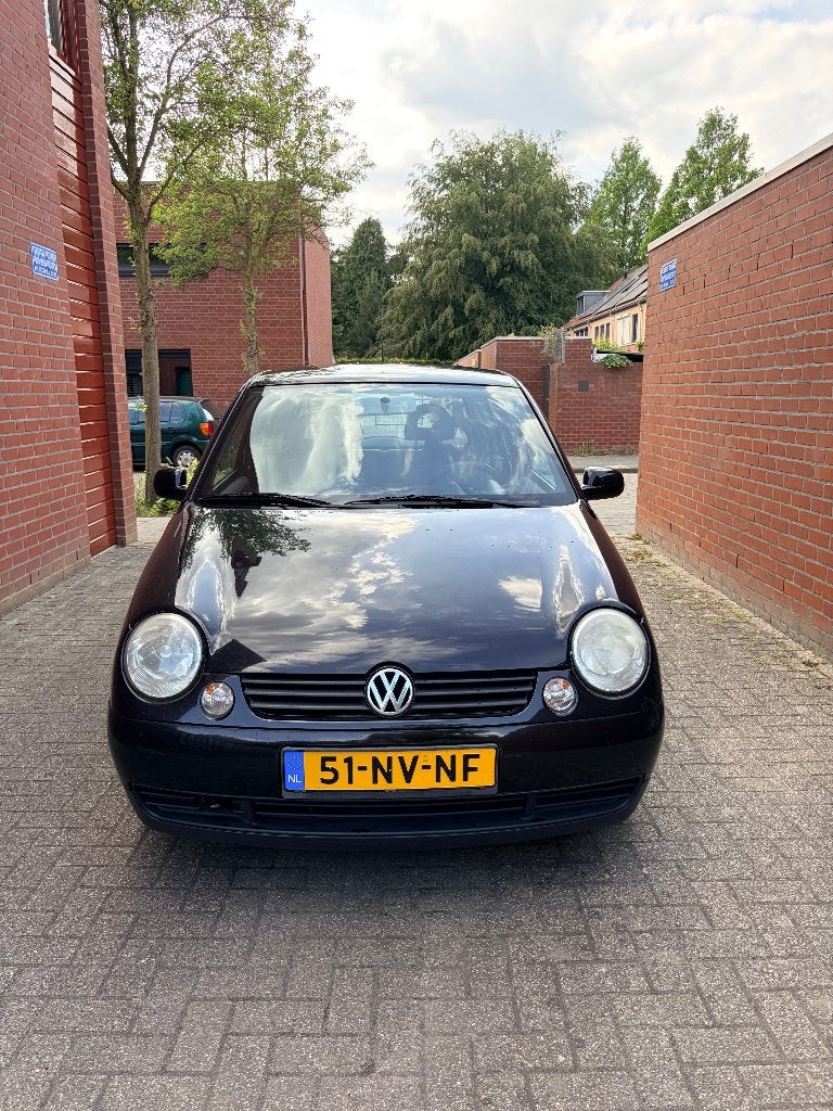 Volkswagen Lupo 1.4 44KW 2004 Zwart, Auto's, Voorwielaandrijving, 450 kg, 31 €/maand, 4 cilinders