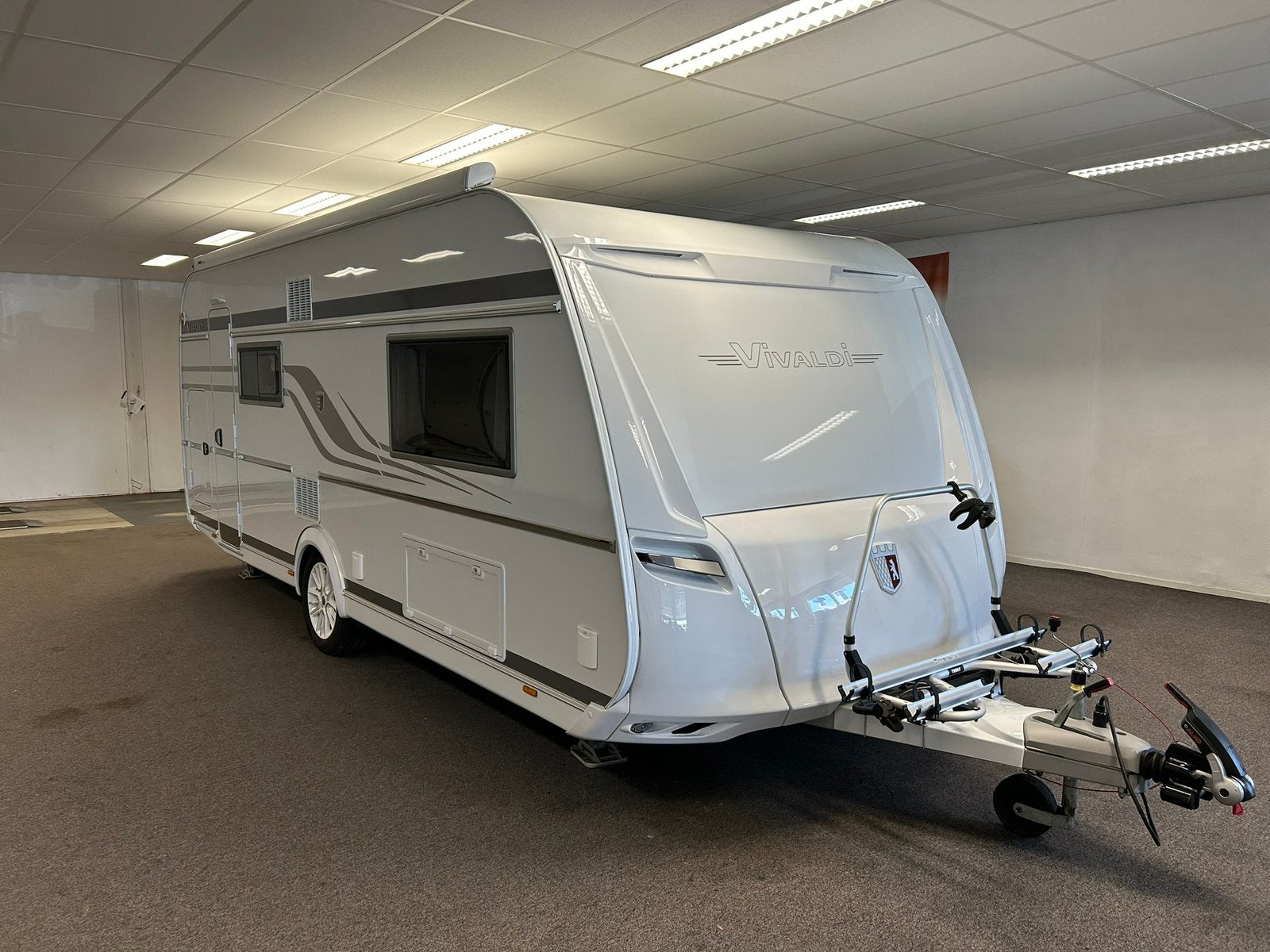 Tabbert Vivaldi 560 EMK stapelbed enkele bedden, als nieuw, Caravans en Kamperen, Dwars-stapelbed, Luifel, Tabbert, Treinzit