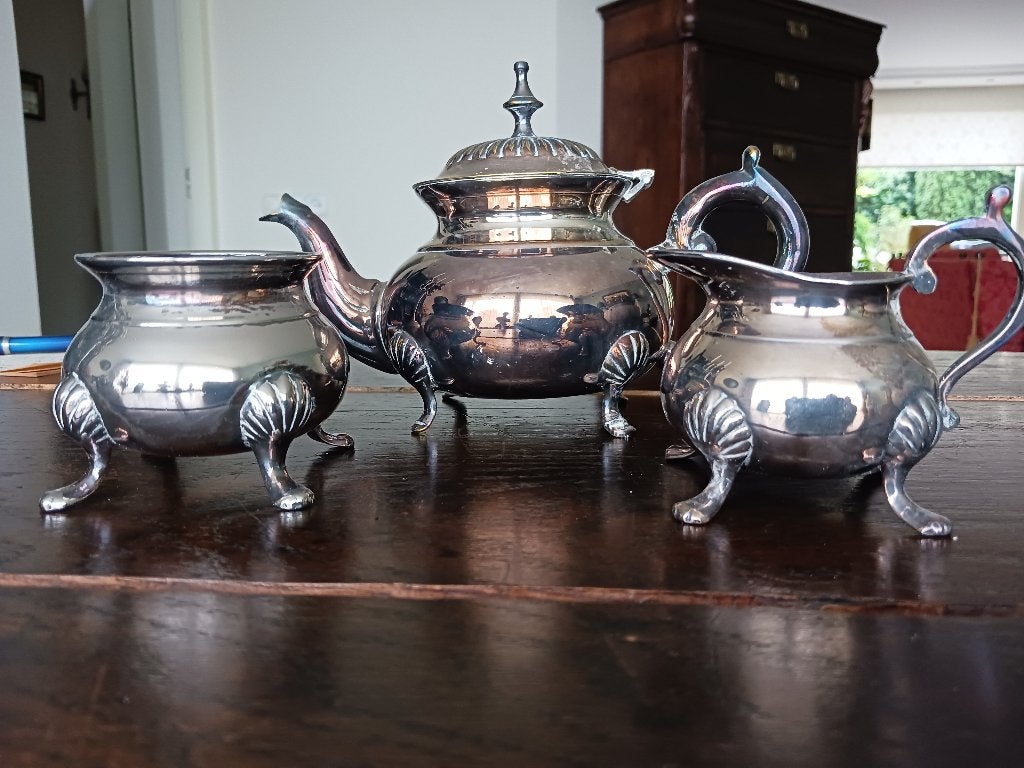 verzilverde thee-set, Ophalen