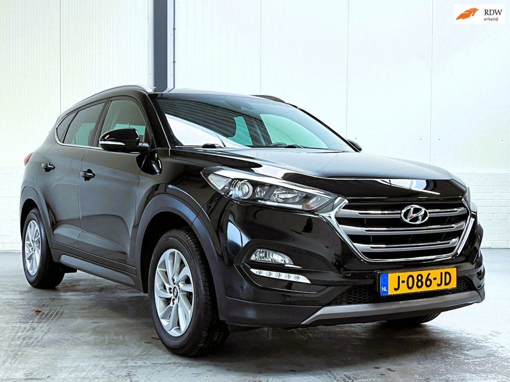 Hyundai Tucson 1.6 GDi Premium|Leder Trekhaak|Camera, Auto's, Hyundai, Voorwielaandrijving, Gebruikt, 4 cilinders, Leder