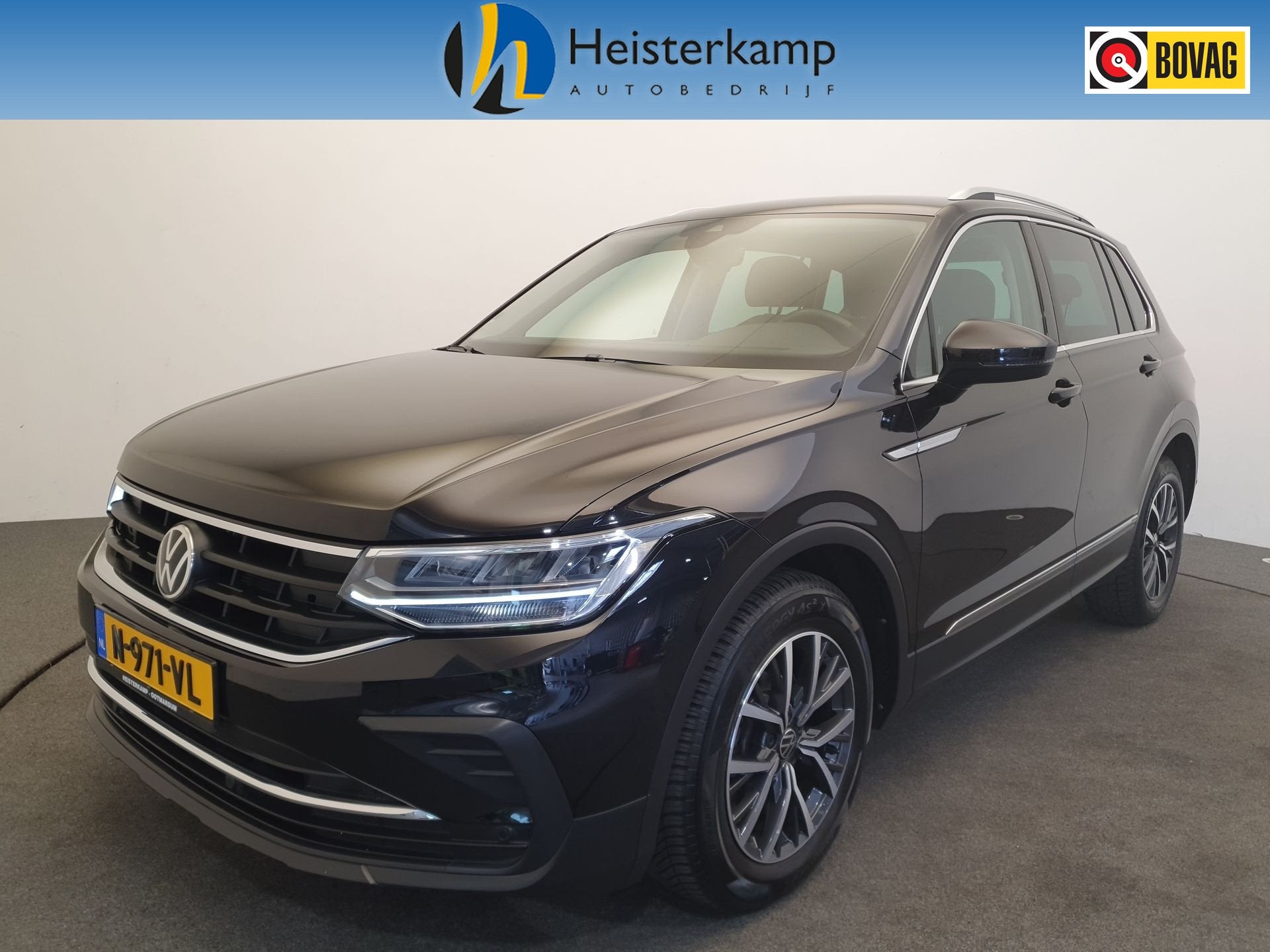 Volkswagen Tiguan 1.5 TSI 150pk DSG/AUT Life Business Wegkla, Auto's, Stof, 4 cilinders, Zwart, Automatische klimaatregeling