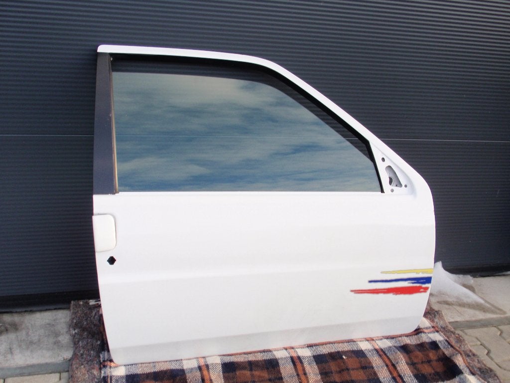 Deuren blauw links en 1 rechts in wit,  Peugeot 106., Auto-onderdelen, Ophalen, Gebruikt, Deur, Rechts