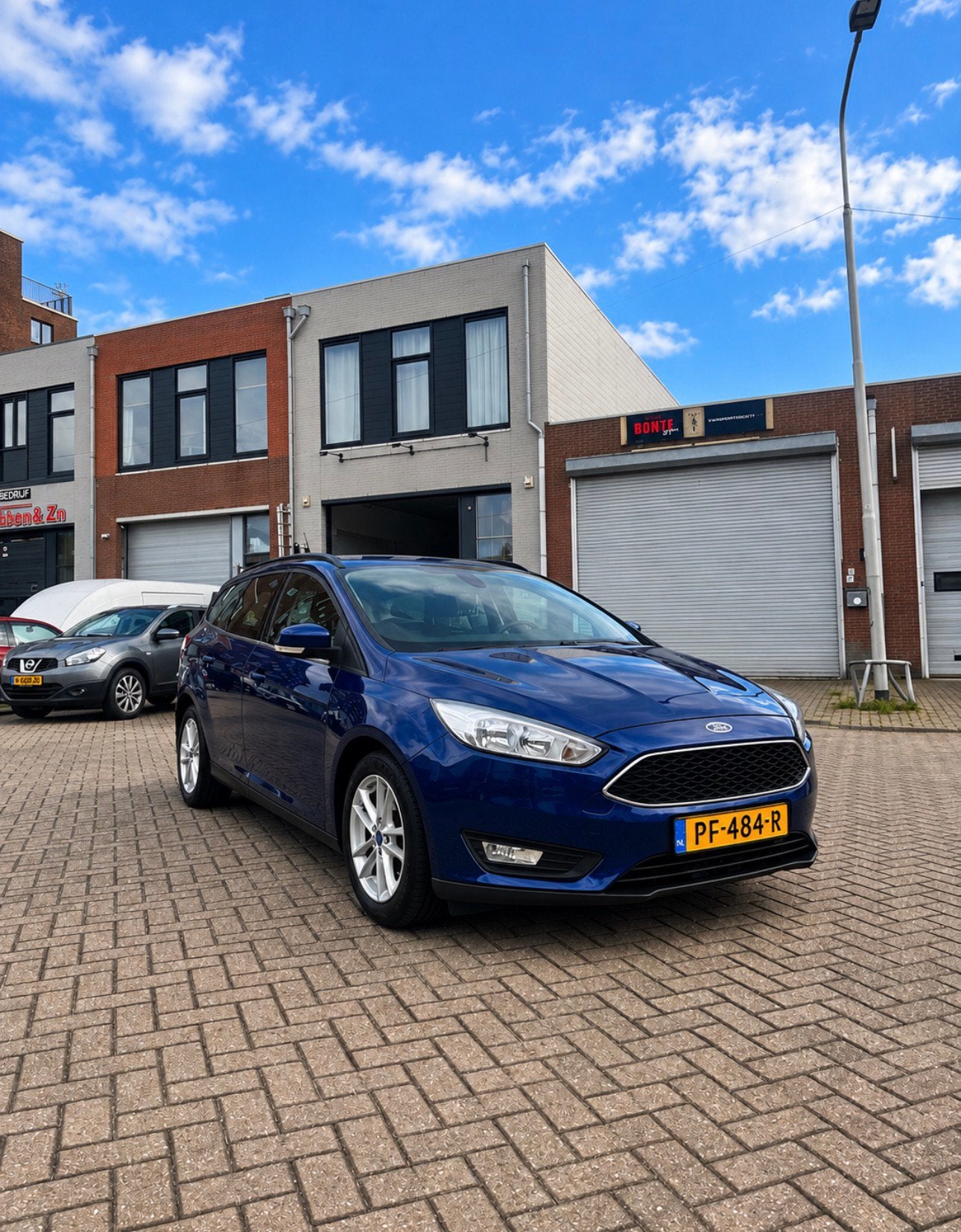 Ford Focus Wagon 1.0 EcoBoost 125PK | DISTRIBUTIE VERVANGEN, Auto's, Zwart, Blauw, Handgeschakeld, 1216 kg