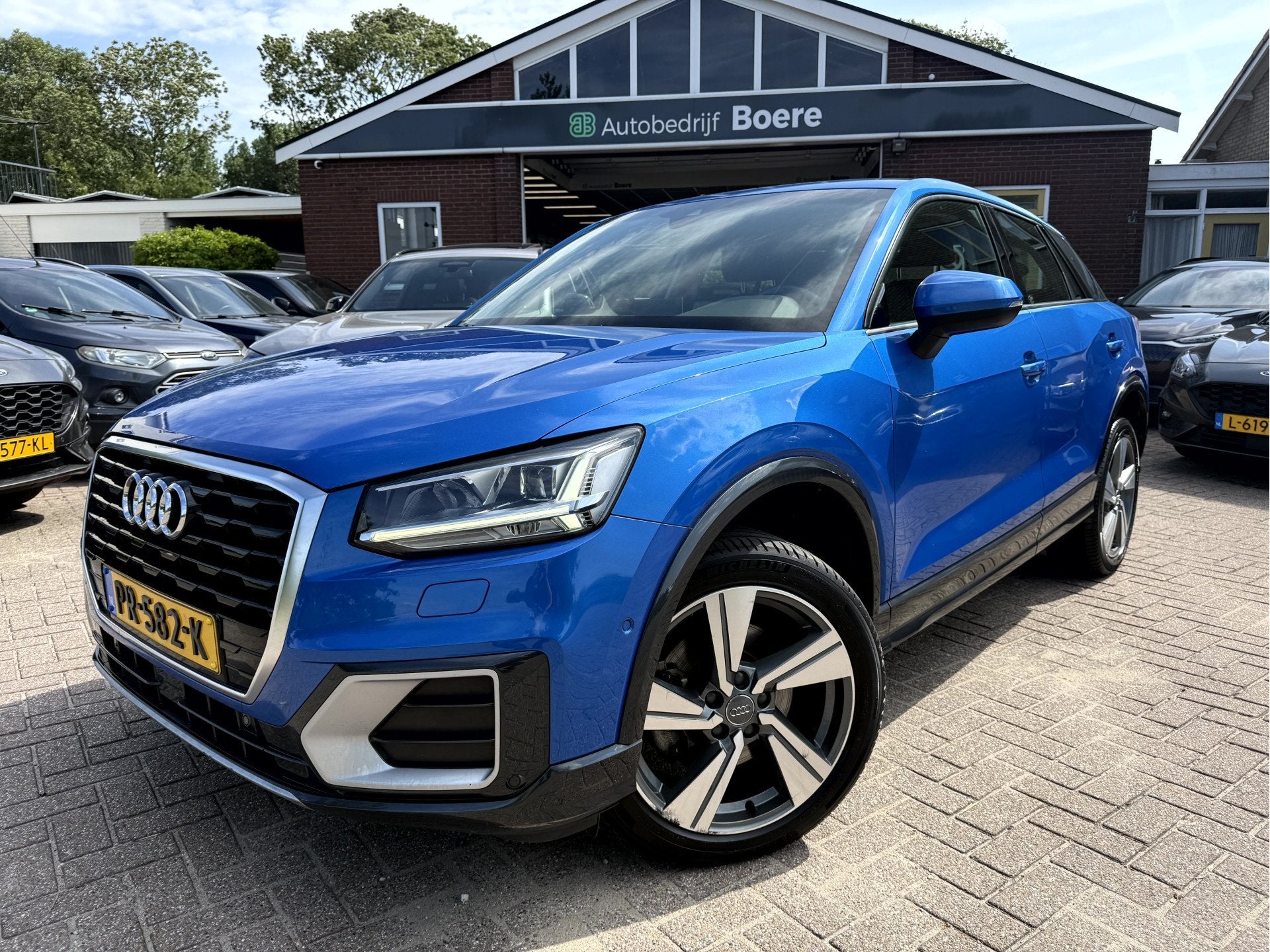 Audi Q2 1.4 TFSI 150pk Design NLAuto, Virt.Dash, Stoelverwar, Gebruikt, 4 cilinders, 150 pk, Blauw