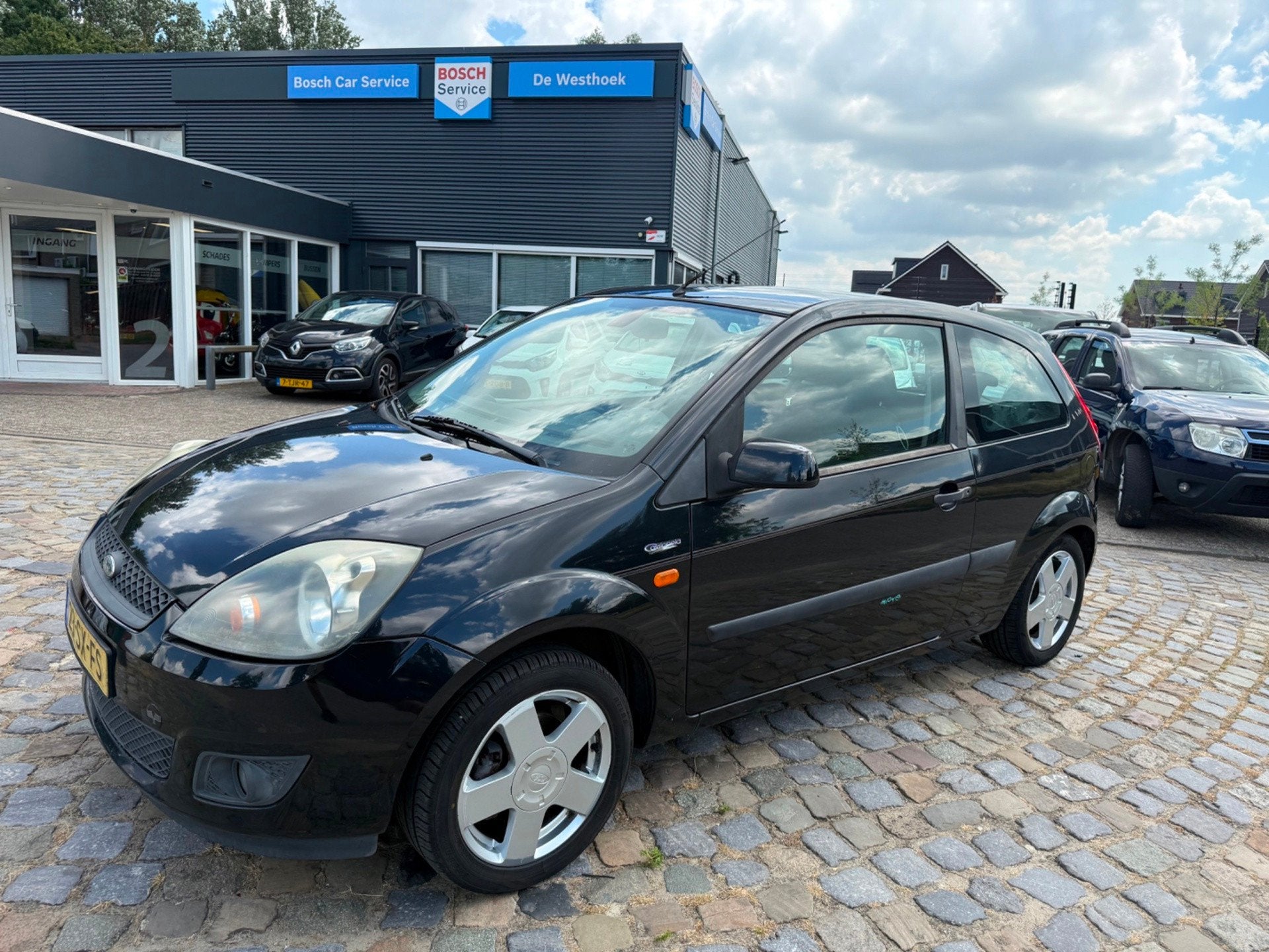 Ford Fiesta 1.3-8V Futura, Auto's, 1299 cc, 4 cilinders, Metallic lak, Zwart