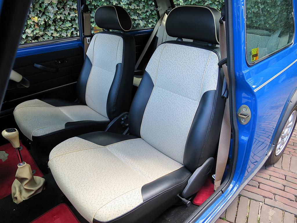 MINI Cooper 1.3 MPI Unieke auto met zeer lage km-stand!, Voorwielaandrijving, 12 maanden, 54 pk, Zwart