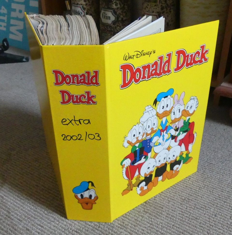 Donald Duck Extra 2002 en 2003 compleet in verzamelband, Boeken, Gelezen, Complete serie of reeks, Walt Disney, Ophalen of Verzenden