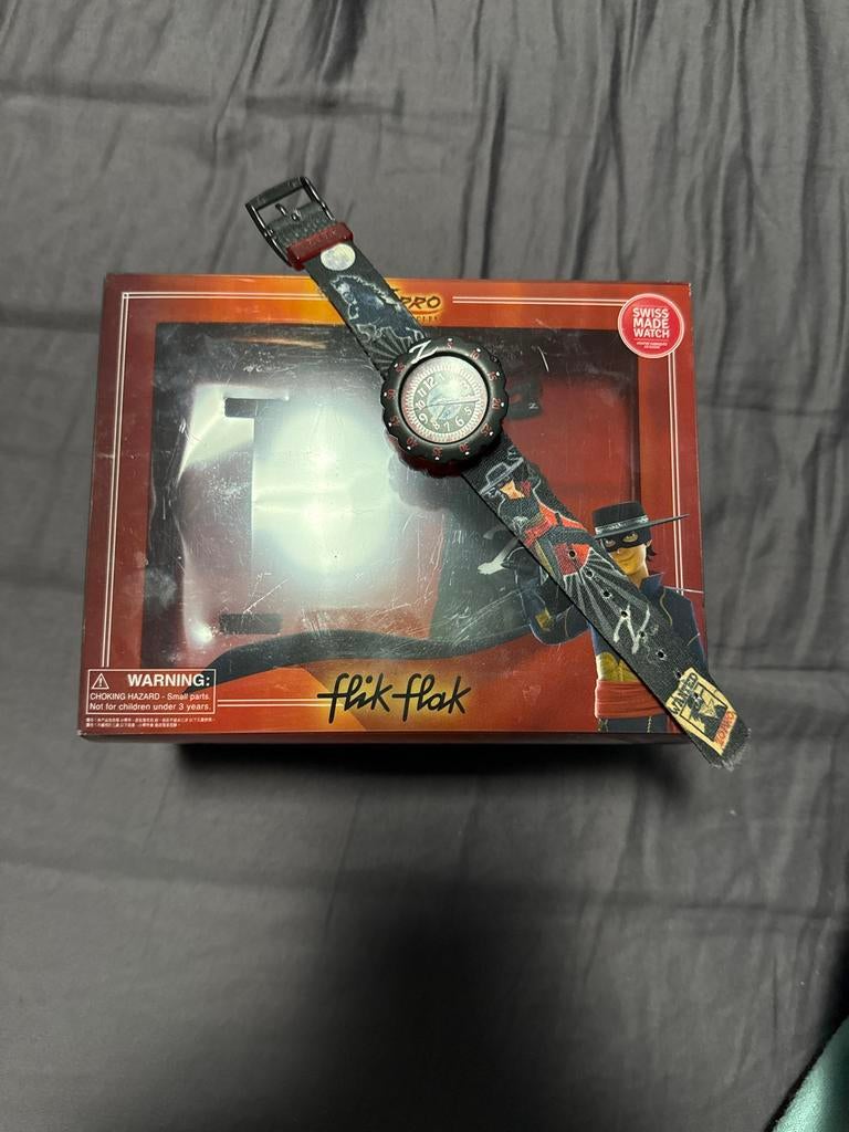 Zorro Flik Flak Kinderhorloge - Swiss Made, Sieraden, Tassen en Uiterlijk, Horloges | Kinderen, Ophalen of Verzenden, Nieuw, Zwart