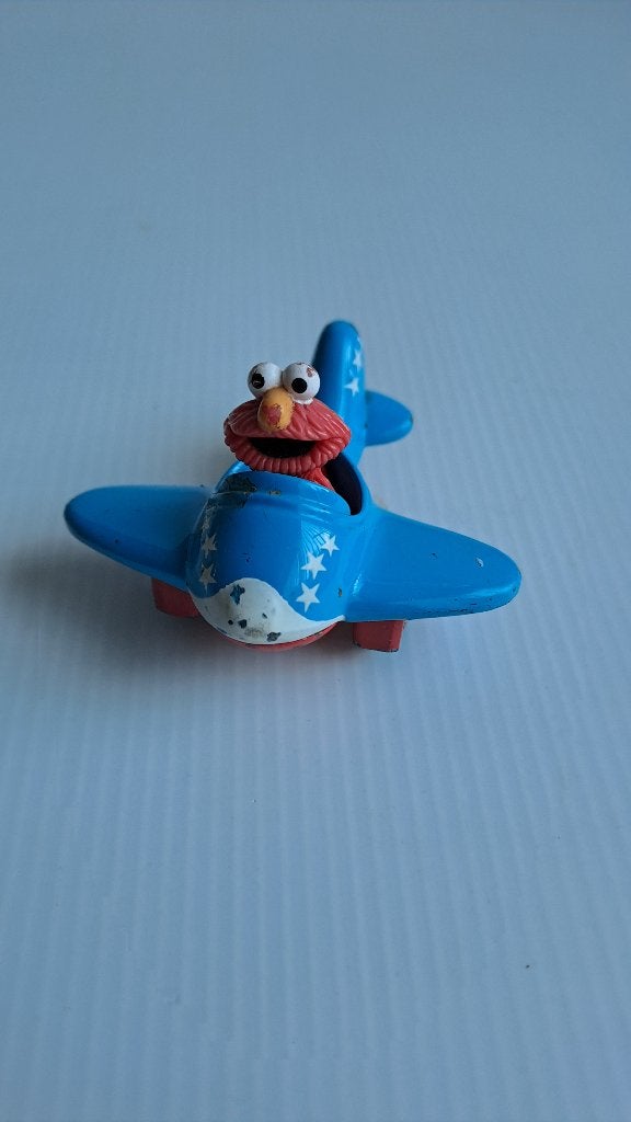 Vintage Elmo in vliegtuig, Verzamelen, Ophalen of Verzenden, Gebruikt