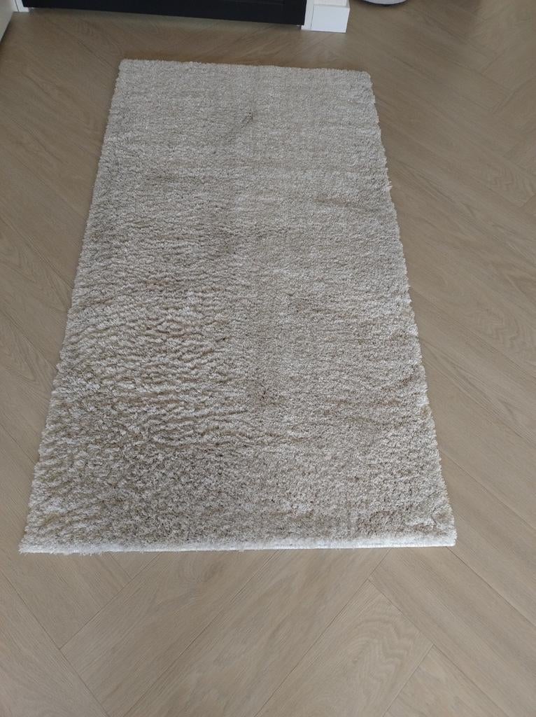 Hoogpolig vloerkleed beige 150/80 cm., Ophalen, Nieuw, 50 tot 100 cm, Minder dan 100 cm