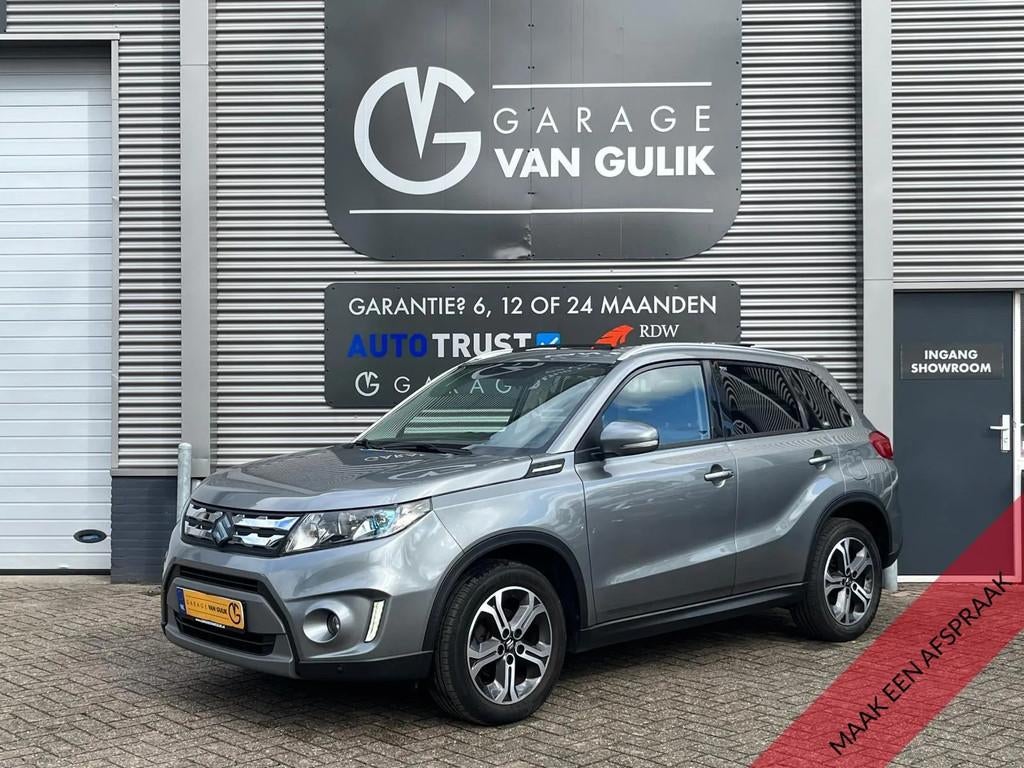 Suzuki Vitara 1.6 120PK Clima,Cruise,Panodak,Navi,Leder/Alca, Gebruikt, Zwart, 4 cilinders, Met garantie (alle)