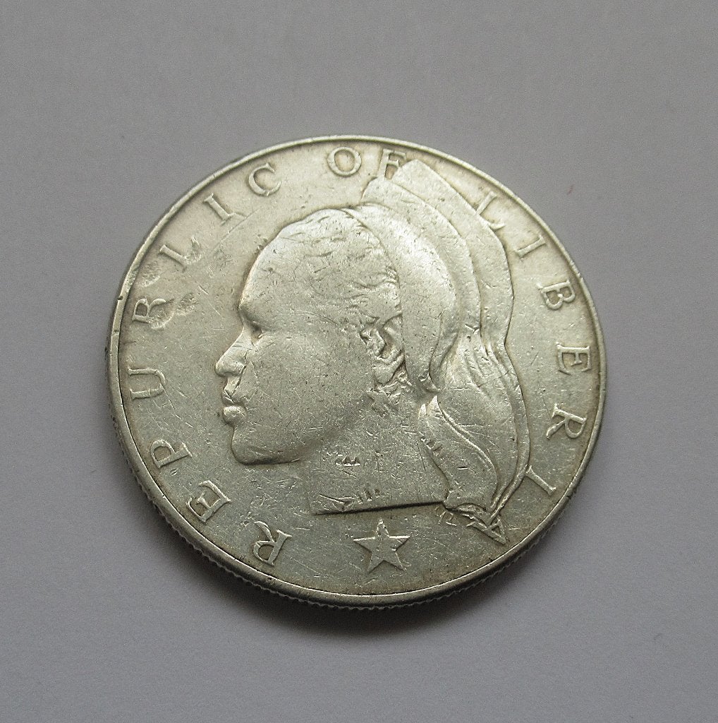 liberia 1 dollar 1962, Postzegels en Munten, Munten | Afrika, Verzenden, Overige landen, Zilver