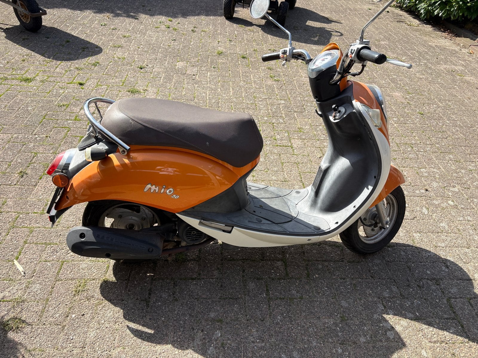SYM Mio 50 Scooter - Oranje/Wit, 6759km, Mio, Gebruikt, Mio, Maximaal 45 km/u