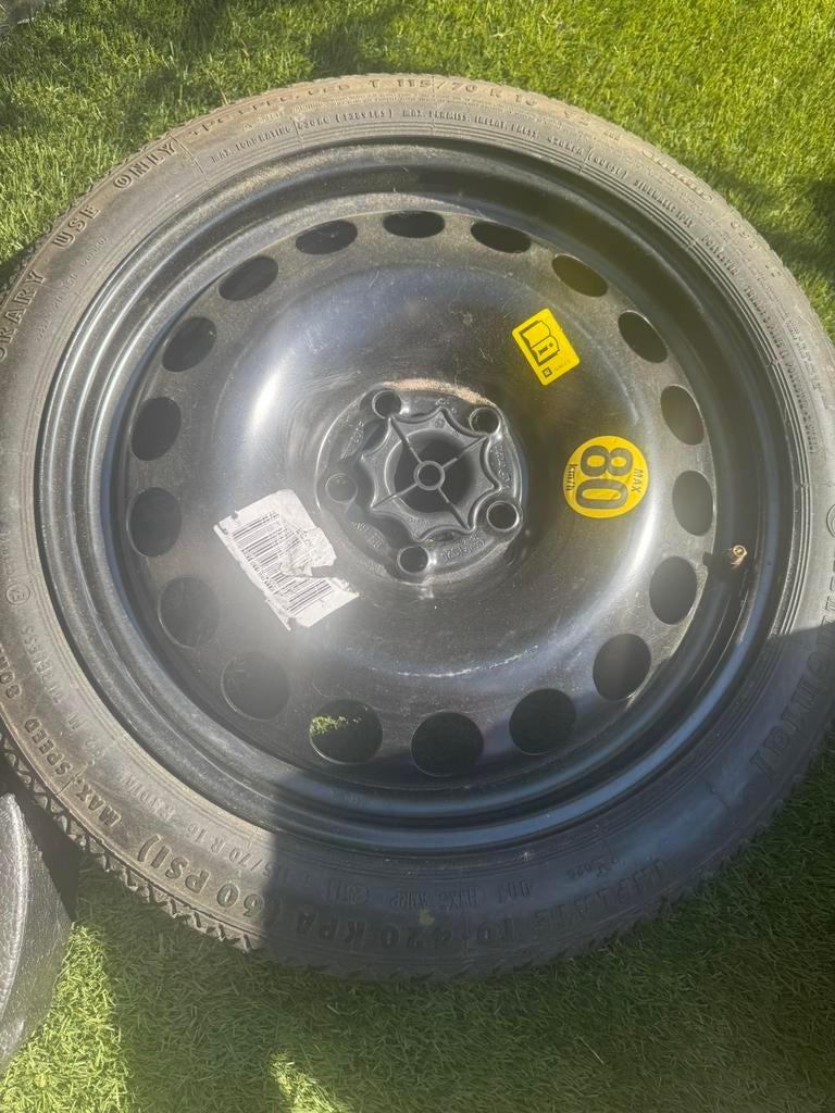 Thuiskomertje Opel Astra 115/70 R16 nieuw! + krikset, Ophalen of Verzenden, Nieuw