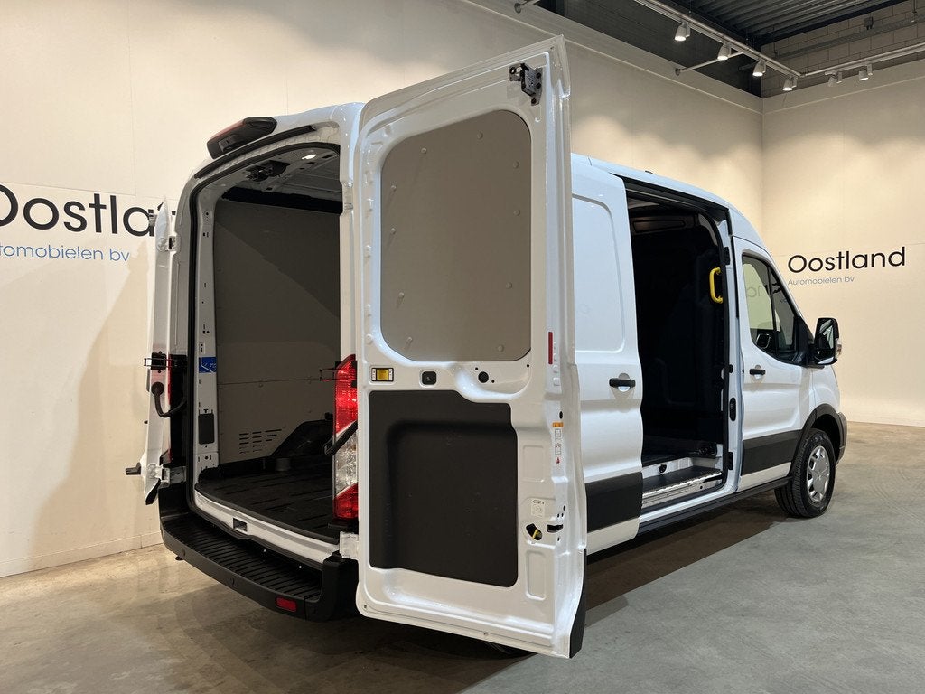 Ford E-Transit 390 (3500 kg) L2H2 Trend 68 kWh / 100% Elektr, Auto's, Bestelauto's, Automaat, Electronic Stability Program (ESP)