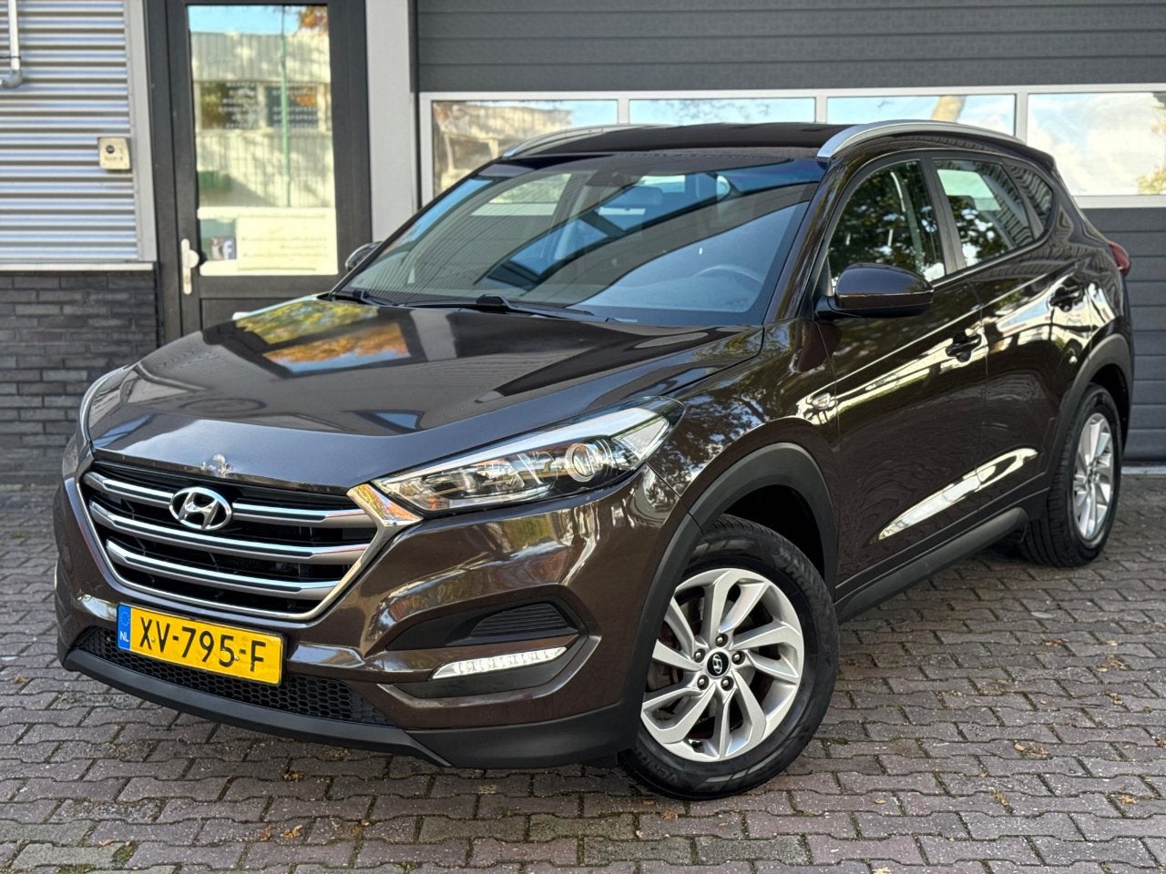 Hyundai Tucson 1.6T-GDI COMFORT (bj 2017), Auto's, Gebruikt, 1591 cc, Bruin, Handgeschakeld