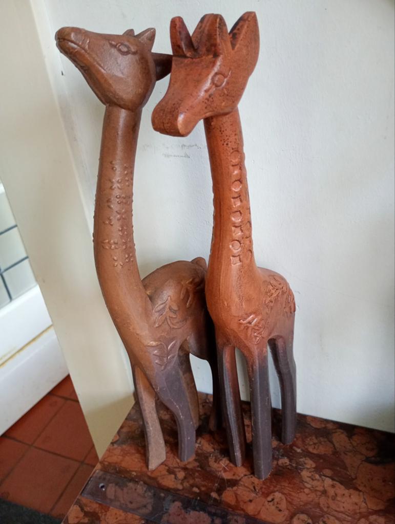 Decoratieve houten giraffen, Ophalen