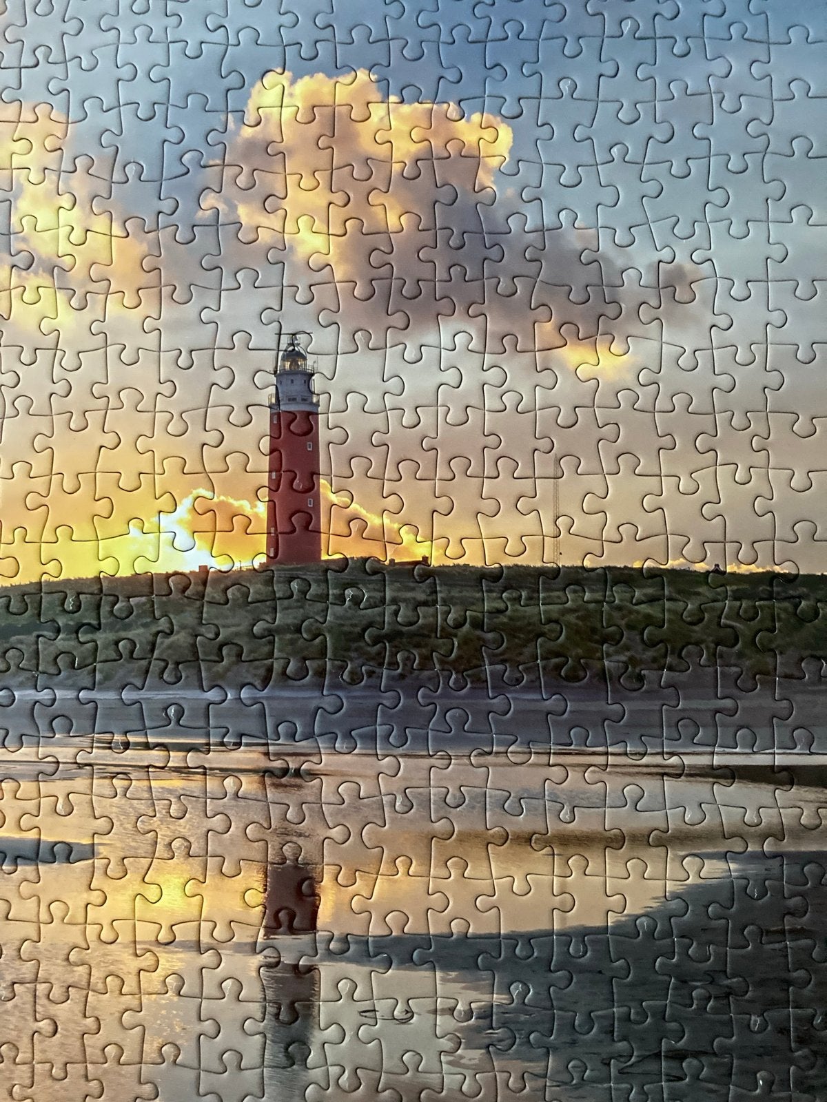 Puzzel Texel vuurtoren 1000 stukjes op houten plaat, Ophalen of Verzenden, 500 t/m 1500 stukjes, Gebruikt, Legpuzzel