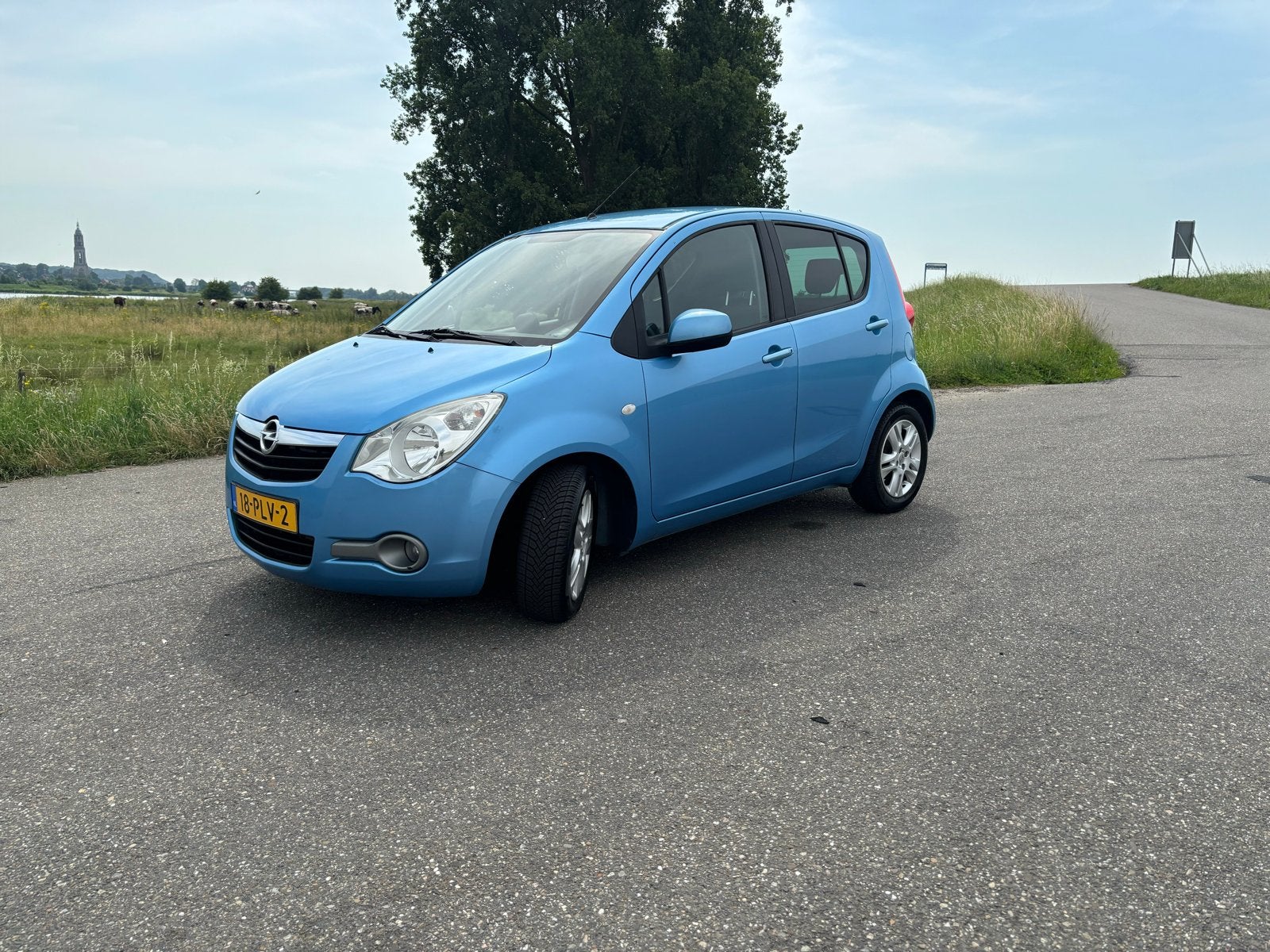 Opel Agila 1.2 16V 69KW 2011 Blauw, Voorwielaandrijving, 40 €/maand, 4 cilinders, 965 kg