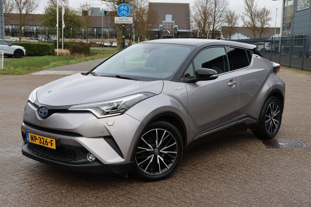 Toyota C-HR 1.8 Hybrid Bi-Tone | 98.000 km | Leder | Trekhaa, Auto's, Toyota, 4 cilinders, 26 km/l, Hybride Elektrisch/Benzine