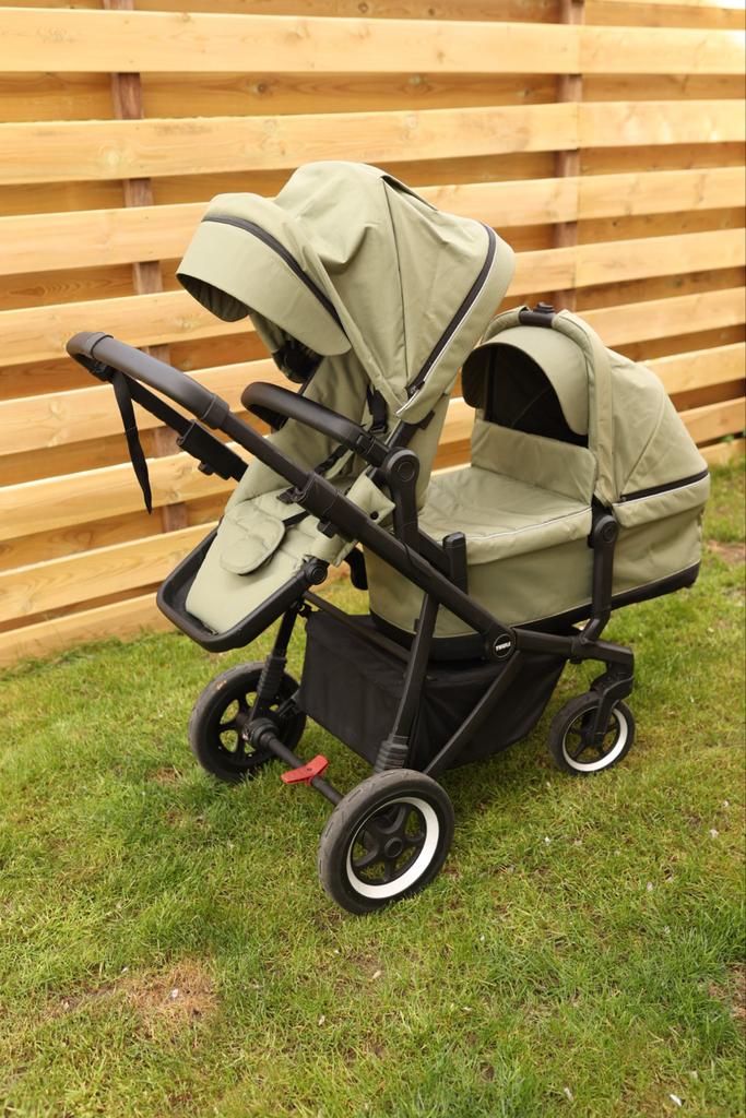 Thule Sleek Combiwagen + maxicosi adapter en regenhoezen, Zo goed als nieuw, Combiwagen, Verstelbare duwstang, Ophalen