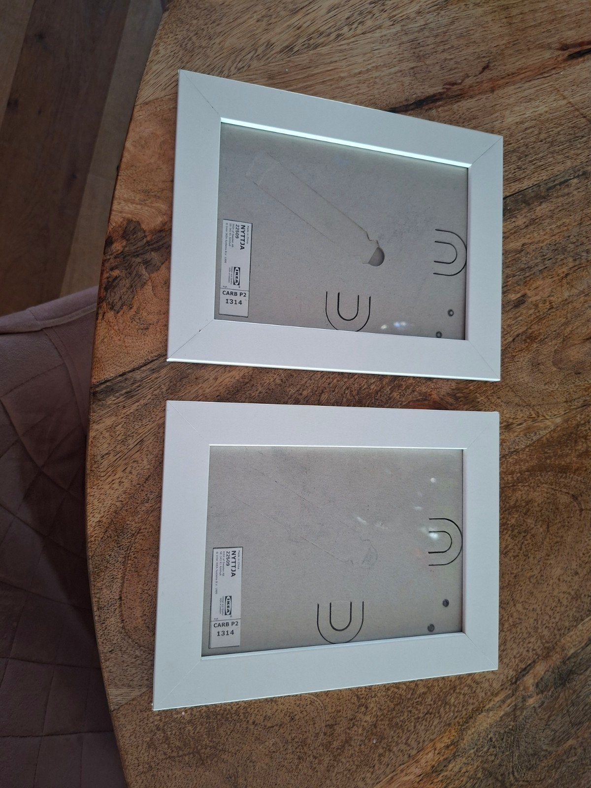 2 witte IKEA NYTTJA fotolijsten 13x18, Kunststof, Ophalen of Verzenden, Zo goed als nieuw, Fotolijst