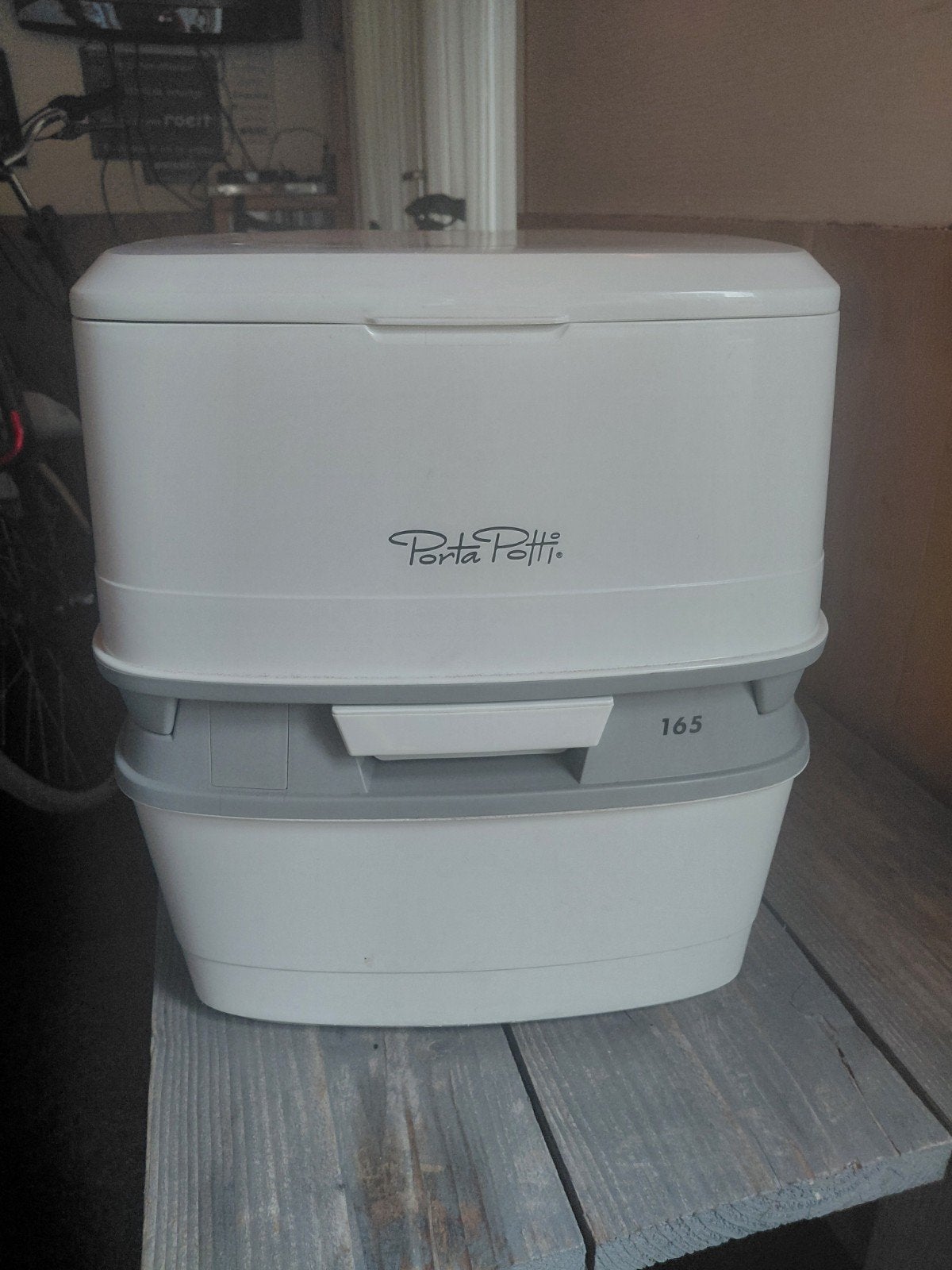 Porta Potti  165, Ophalen