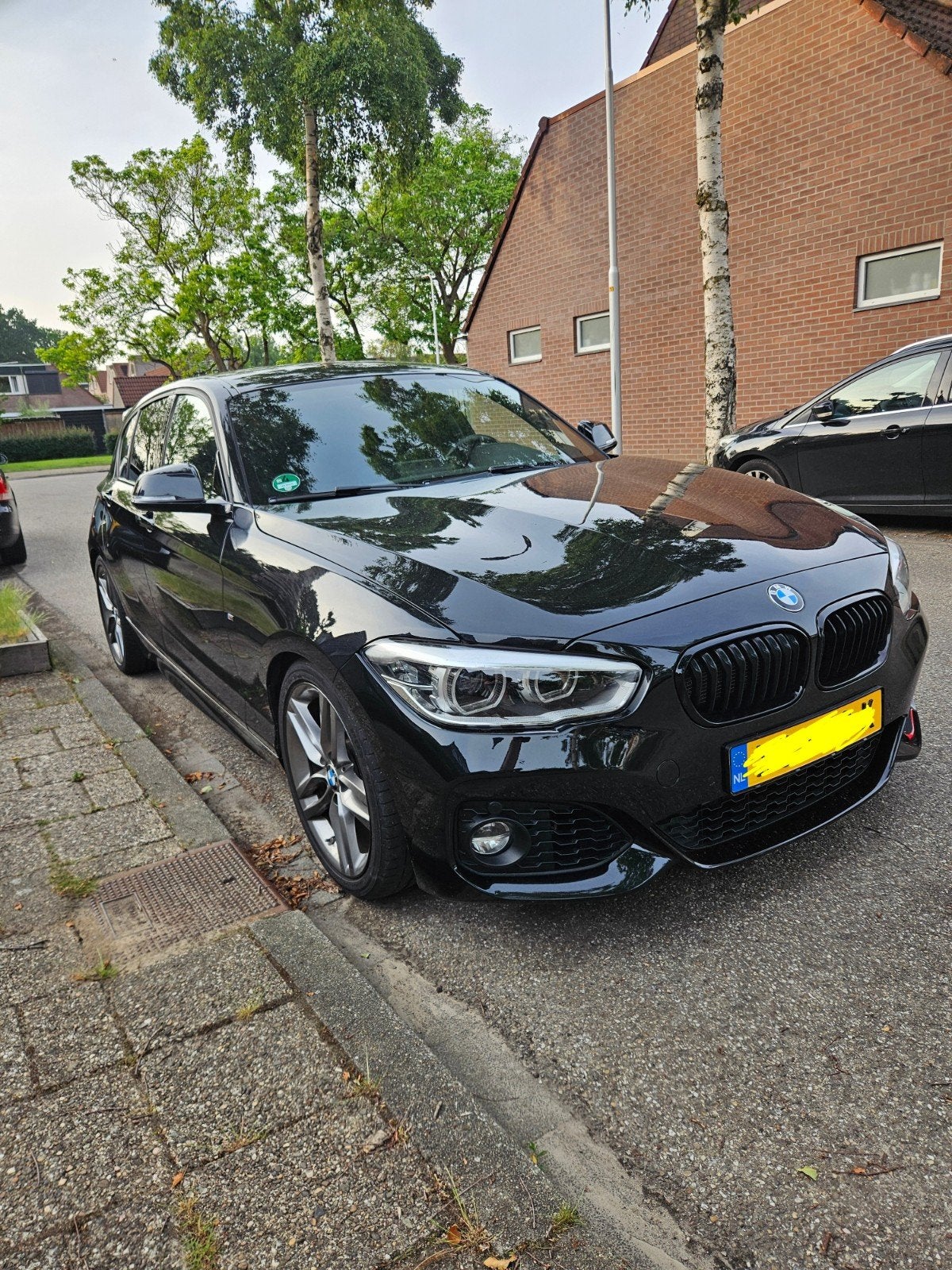 BMW 1-Serie 118i M Aut 2019 Zwart, Auto's, BMW, Euro 5, Achterwielaandrijving, Zwart, 650 kg