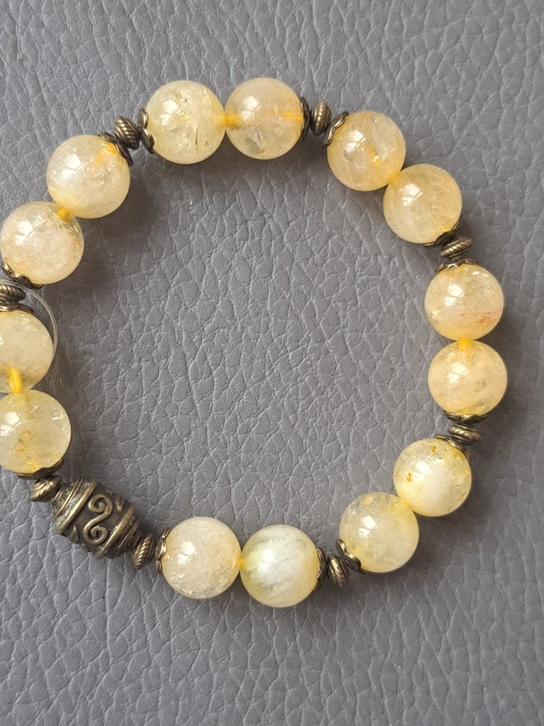 437 edelsteen armband Citrien 10mm, Ophalen of Verzenden, Nieuw, Elastiek, Met edelsteen