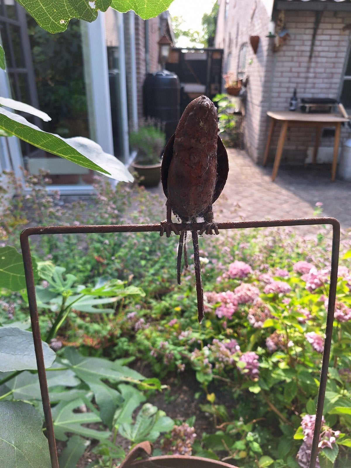 Decoratieve metalen plantenbak met vogel, Tuin en Terras, Tuinbeelden, Ophalen, Gebruikt, Metaal, Dierenbeeld