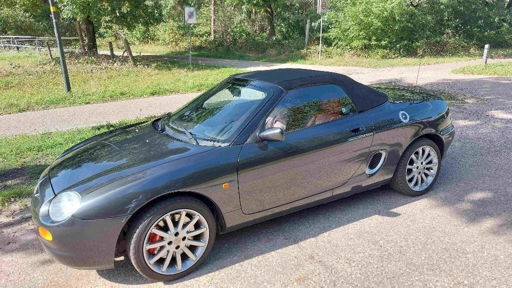 Te koop zeer mooie MG F 1.8 I VVC 1997 Zwart, Achterwielaandrijving, 4 cilinders, Cabriolet, Zwart
